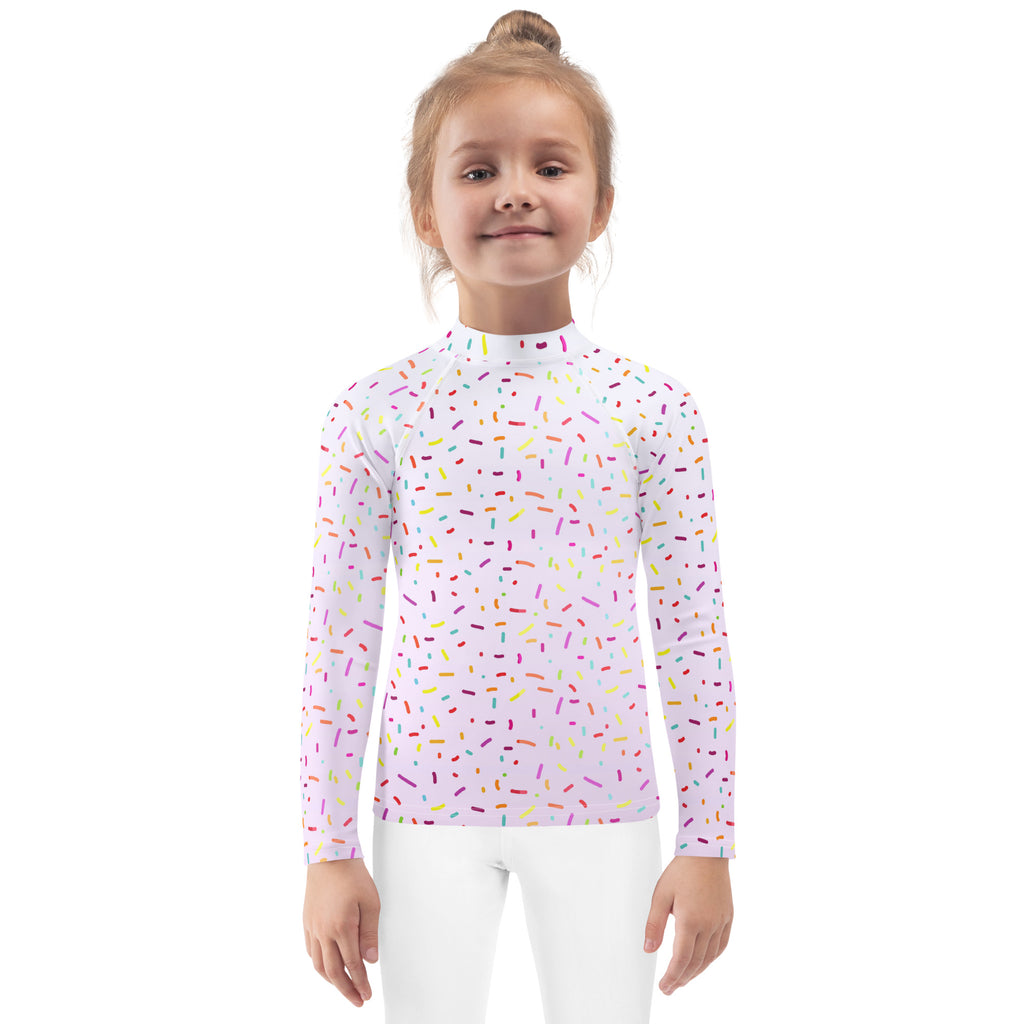A kids colorful sprinkles long sleeve rash guard swim shirt in soft lavender with upf 50 plus for sun protection