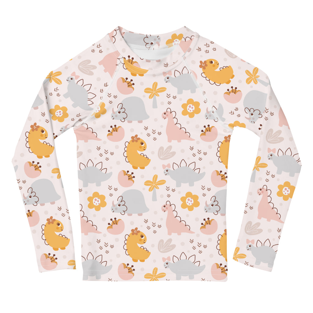 Girls floral dinosaur long sleeve rash guard swim shirt in light colors with cartoon dinosaurs and upf 50 plus protection