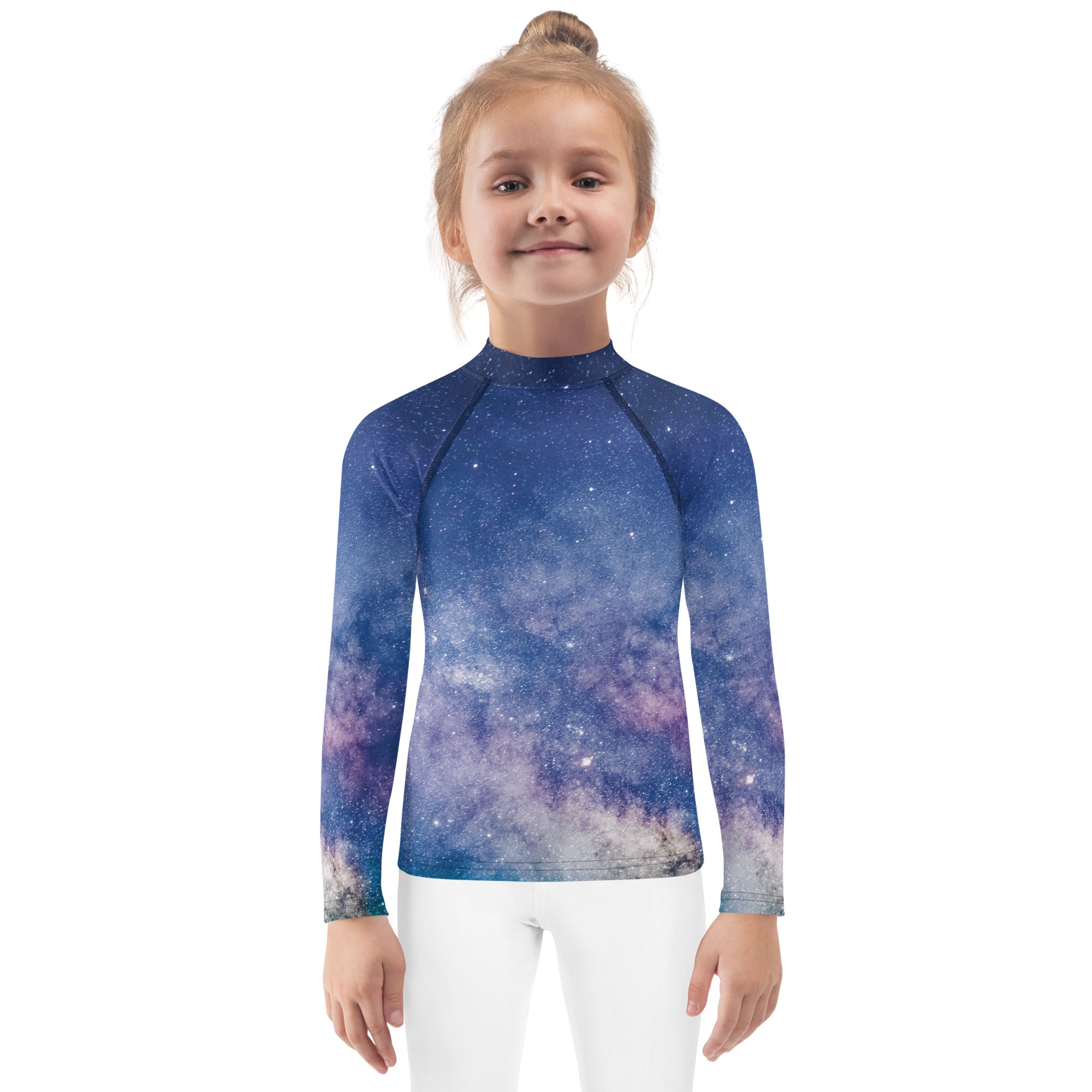 A child wearing a girls realistic galaxy long sleeve rash guard swim shirt with upf 50 sun protection in blue and purple