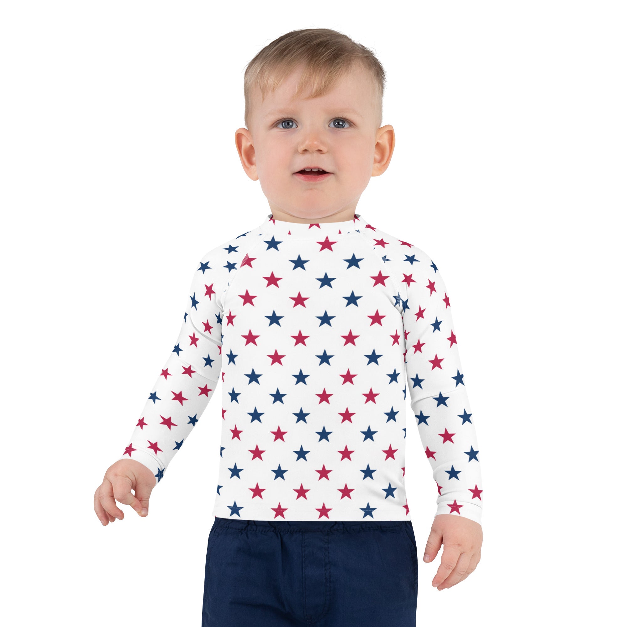 White long-sleeved kids rash guard swim shirt with red and blue stars pattern and upf 50 plus sun protection