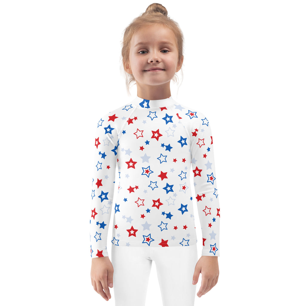 White long-sleeved rash guard swim shirt with red blue and silver stars and upf 50 plus for kids