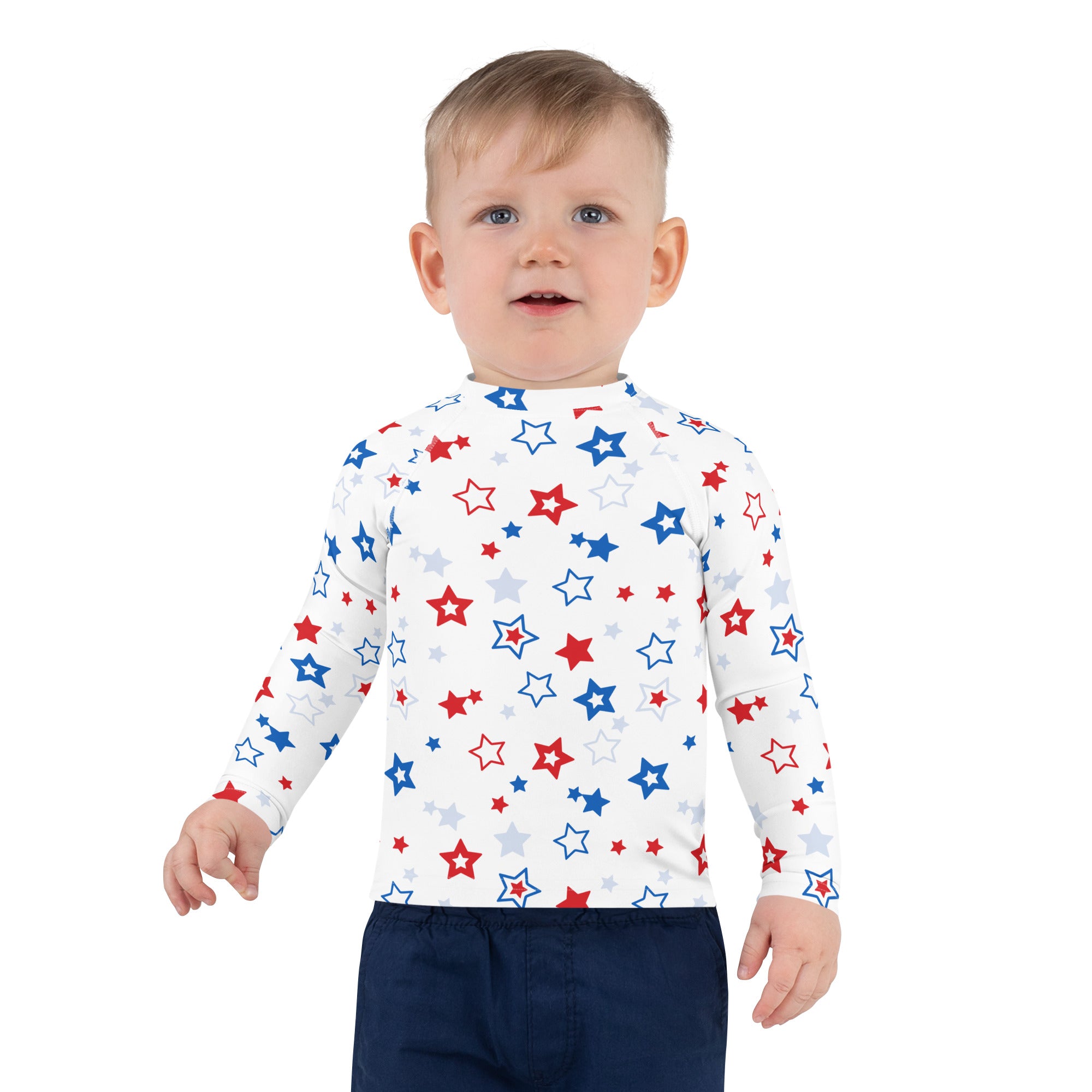 White kids long sleeve rash guard swim shirt with red blue and silver stars and UPF 50 plus sun protection