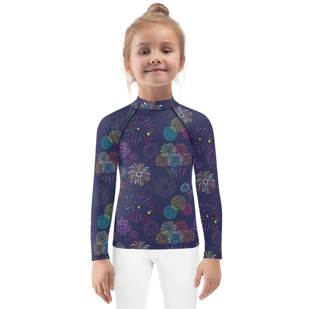 Navy blue kids long sleeve rash guard with vibrant multicolored fireworks pattern and UPF 50 plus swim shirt