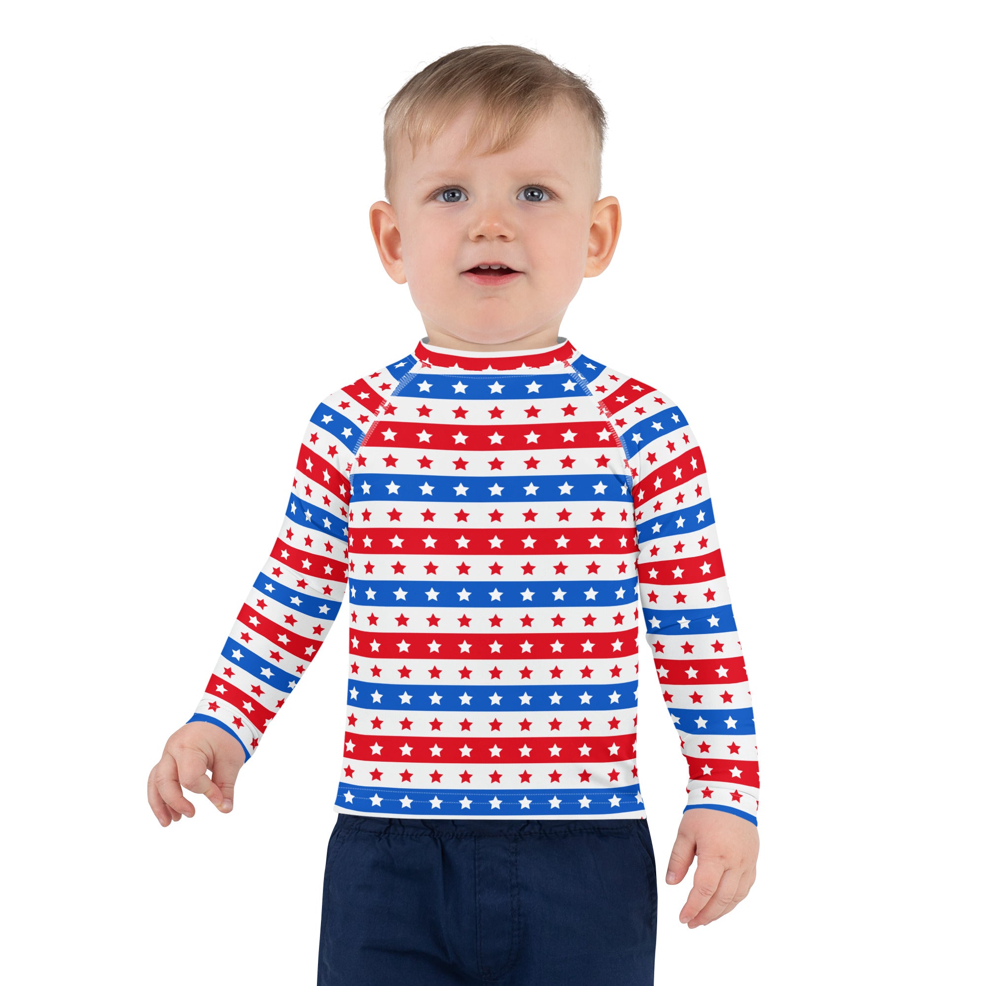 A child wearing a kids red white and blue stars and stripes usa long sleeve rash guard swim shirt with upf 50+