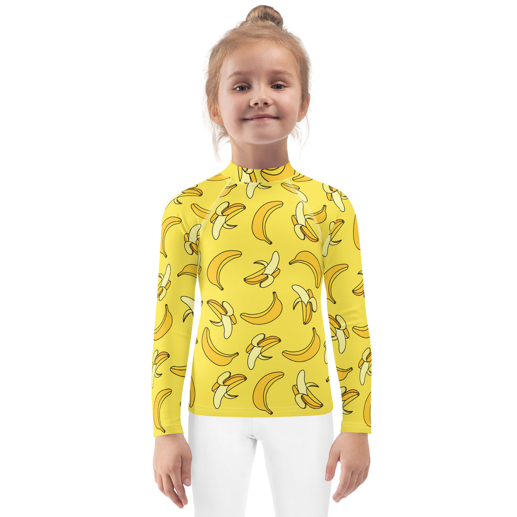 Kids yellow long sleeve rash guard swim shirt with playful banana pattern and upf 50 plus sun protection