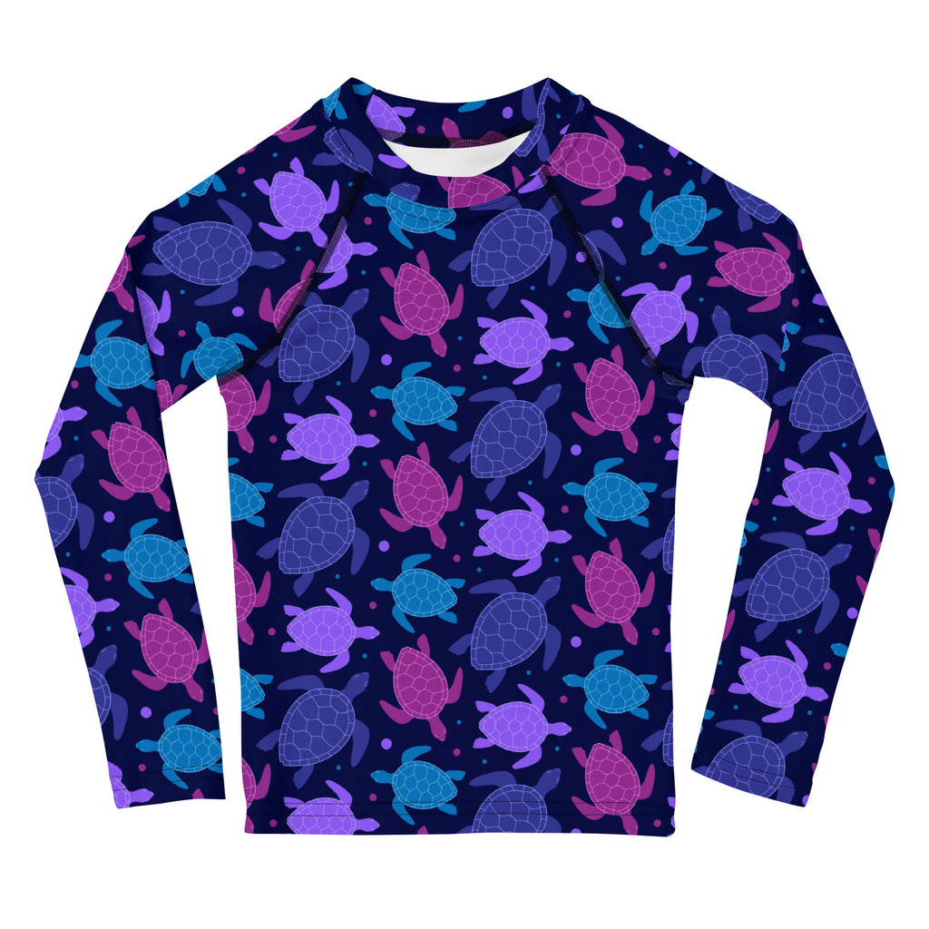 Girls purple sea turtle long sleeve rash guard swim shirt with UPF 50 plus featuring a vibrant sea turtle pattern on navy