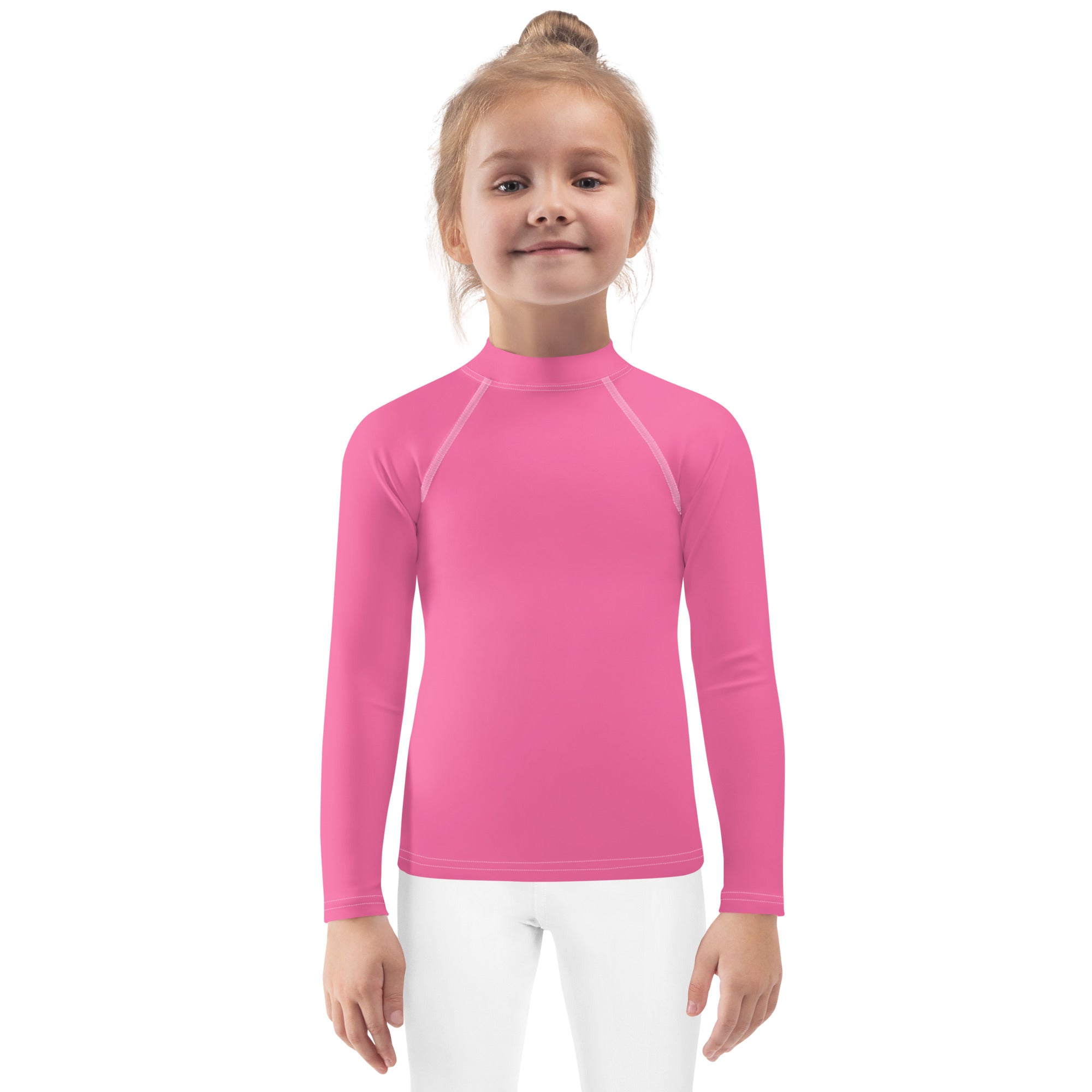 Girls pink long sleeve rash guard swim shirt with upf 50 plus featuring bright pink color and subtle white seam accents