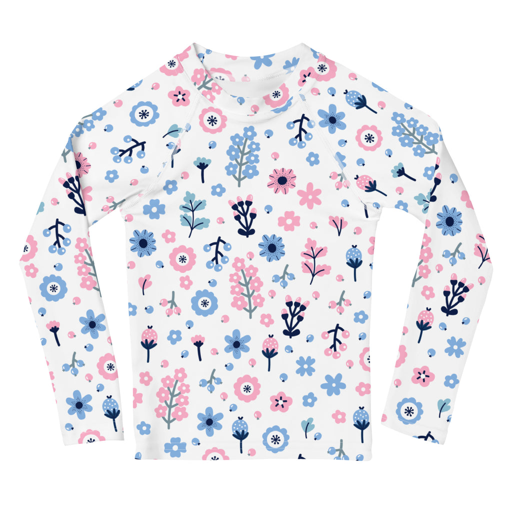 Girls pink and blue floral long sleeve rash guard swim shirt with upf 50 white with playful flower pattern