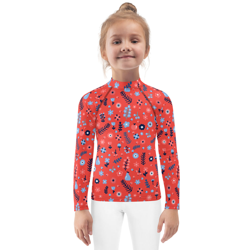 Girls red floral long sleeve rash guard swim shirt with UPF 50+ featuring blue and navy floral motifs