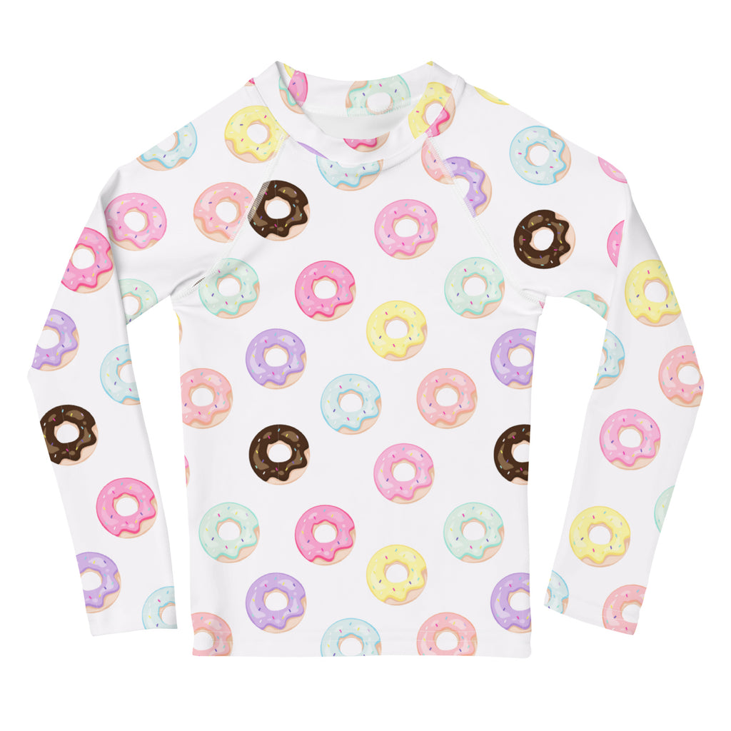 White long-sleeved kids rash guard swim shirt with pastel donut pattern and upf 50 plus sun protection