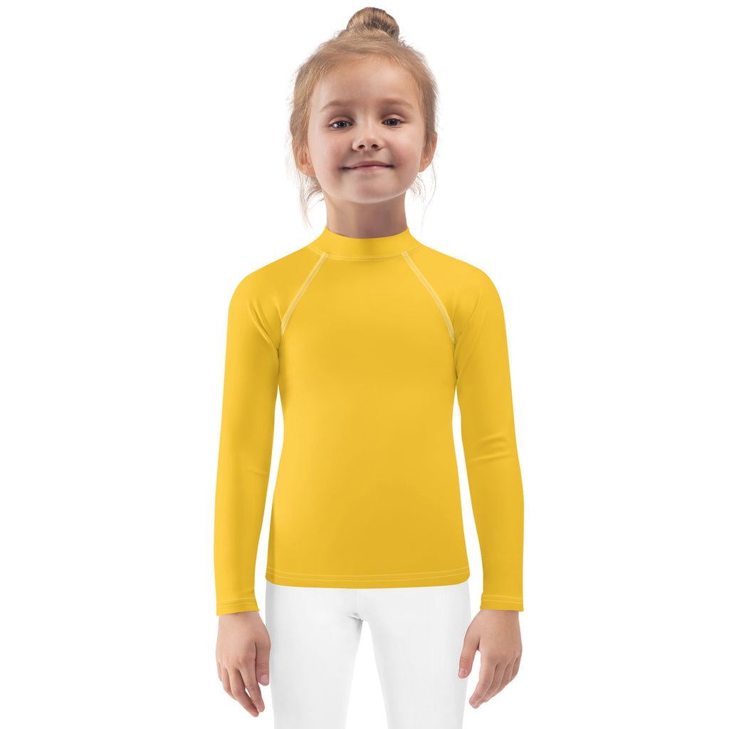 Kids yellow long sleeve rash guard swim shirt with upf 50 plus featuring a high collar and white seam detailing
