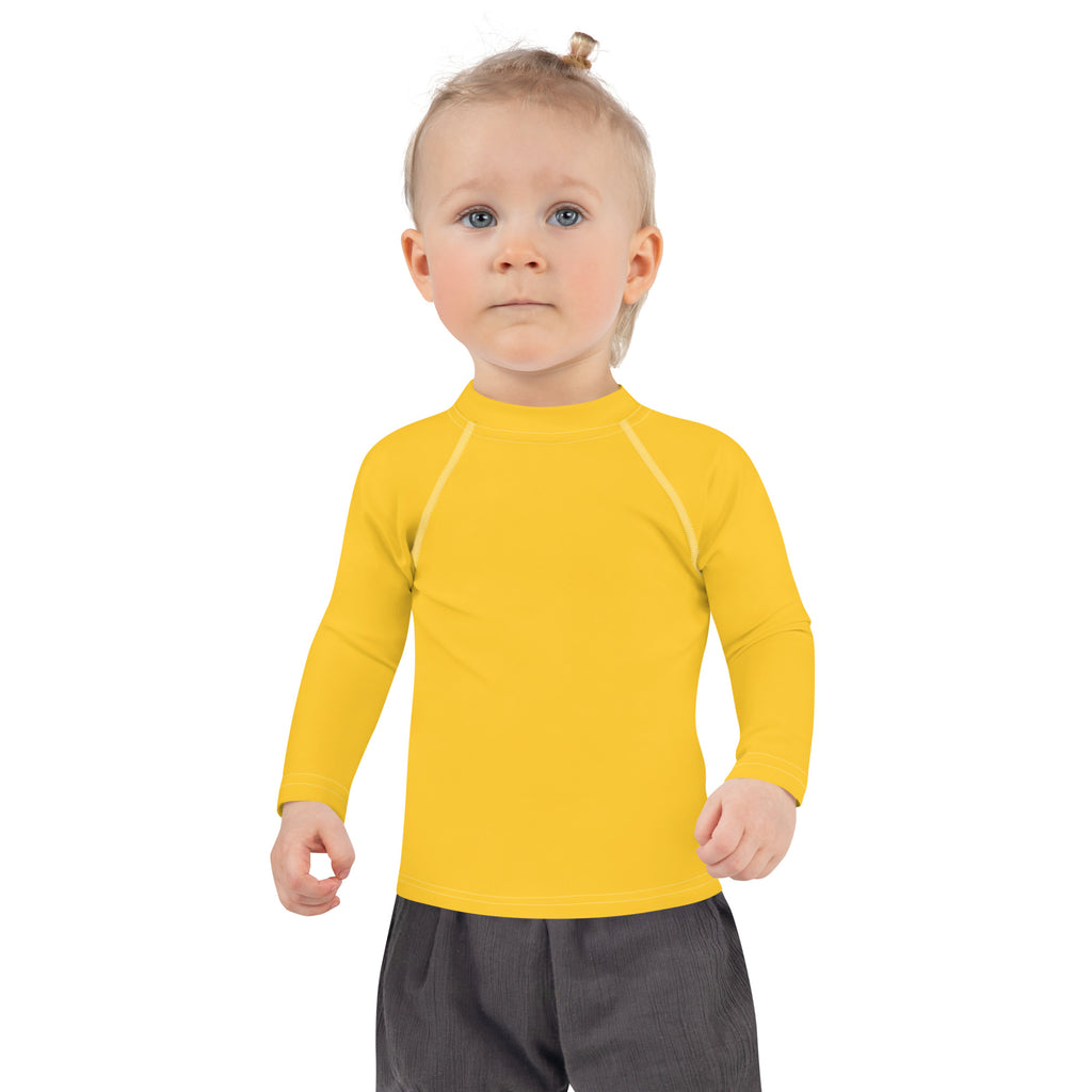 Kids yellow long sleeve rash guard swim shirt with upf 50 plus featuring subtle white seam detailing
