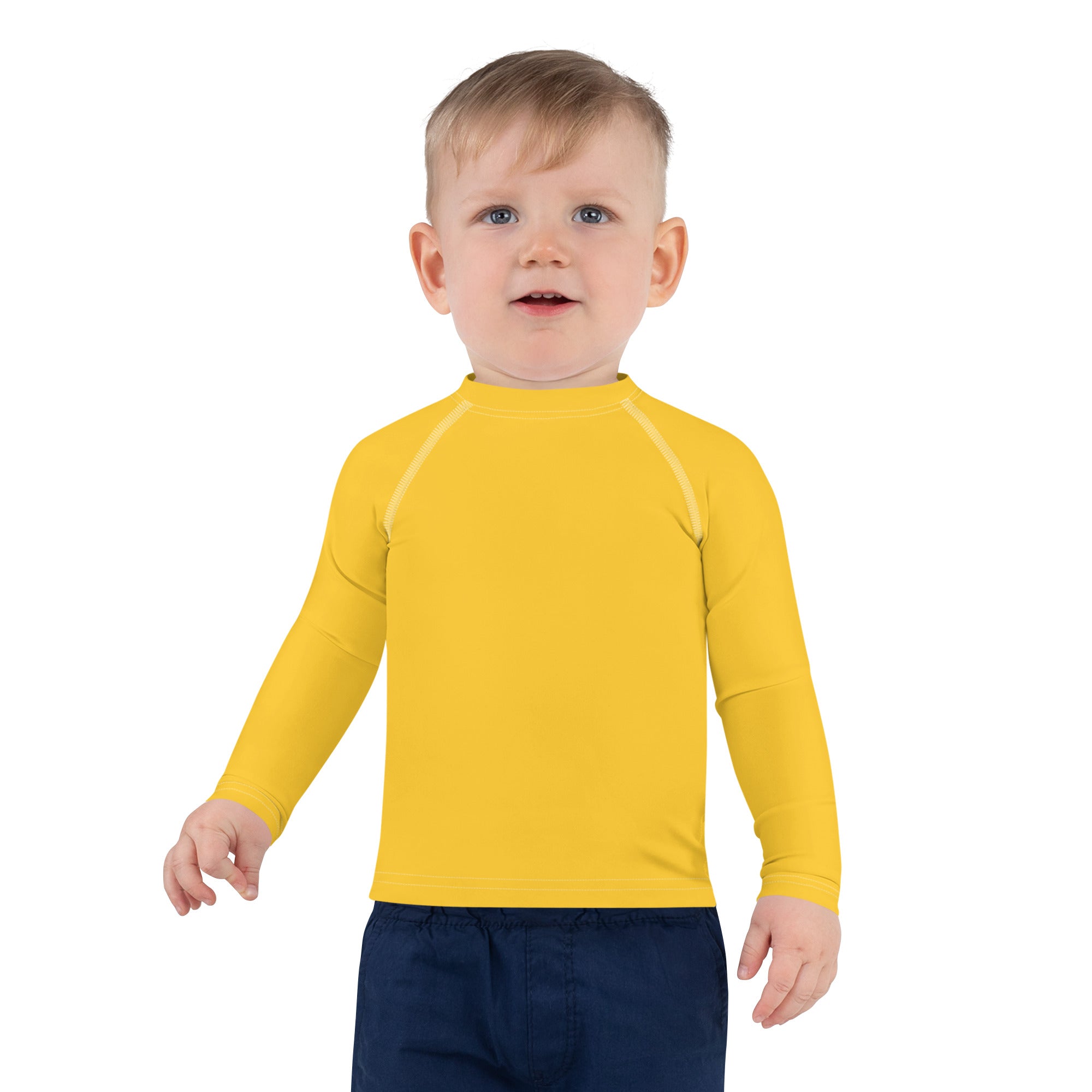 Kids yellow long sleeve rash guard swim shirt with subtle white seams and UPF 50 plus sun protection