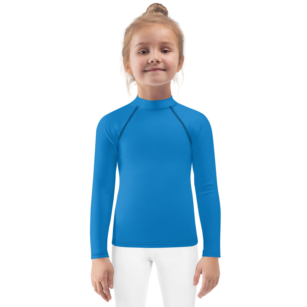 Kids navy blue long sleeve rash guard swim shirt with upf 50 plus featuring bright blue fabric and subtle seam detailing