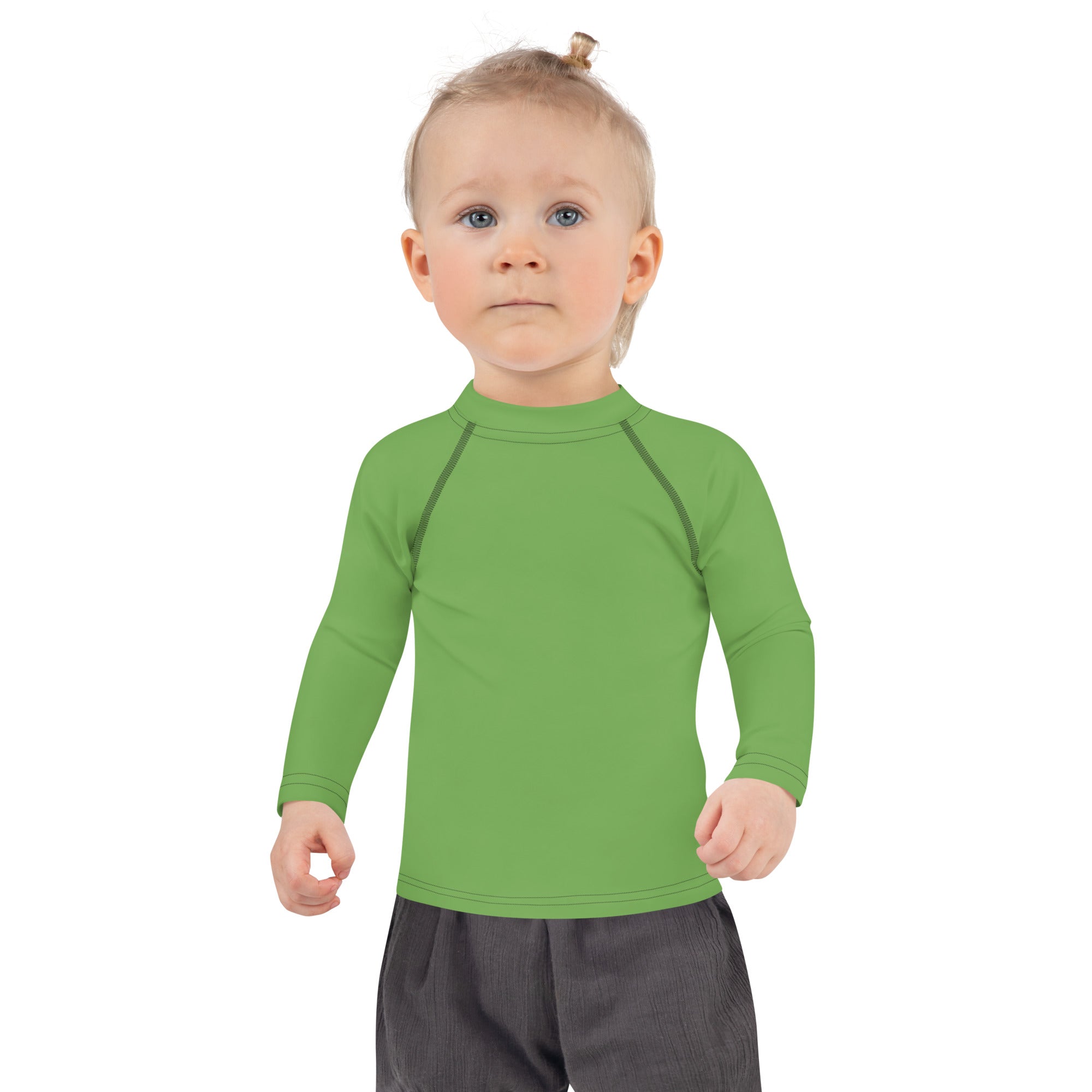 Kids green long sleeve rash guard swim shirt with black seam detailing and UPF 50 plus sun protection