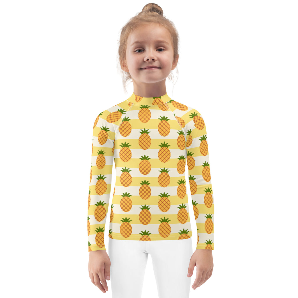 Kids yellow and white long sleeve rash guard swim shirt with pineapple pattern and upf 50 plus sun protection