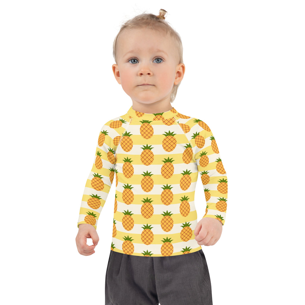 Kids pineapple striped long sleeve rash guard swim shirt with upf 50 plus yellow and white stripes and orange pineapples