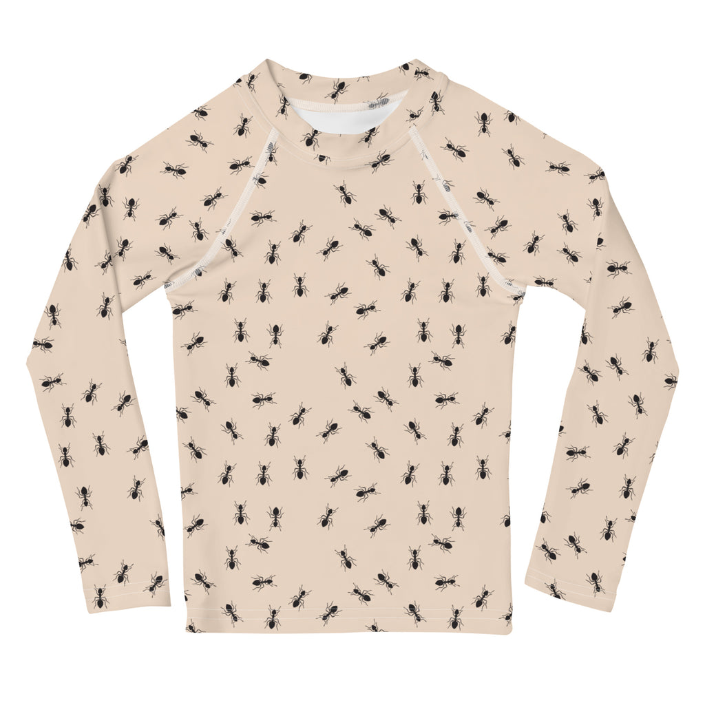 Beige kids long sleeve rash guard swim shirt with black ant pattern and upf 50 plus sun protection