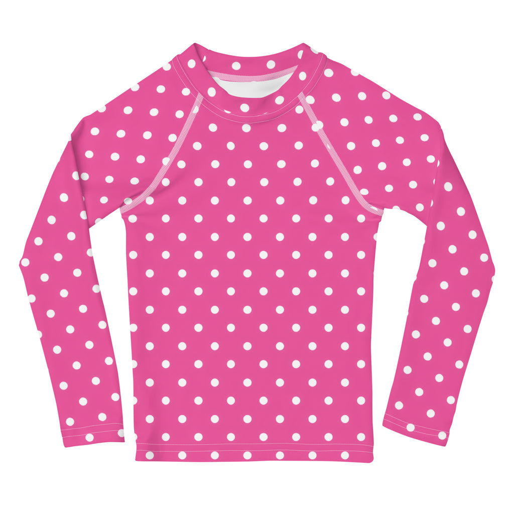 Girls pink long sleeve rash guard swim shirt with white polka dots and upf 50 plus for sun protection