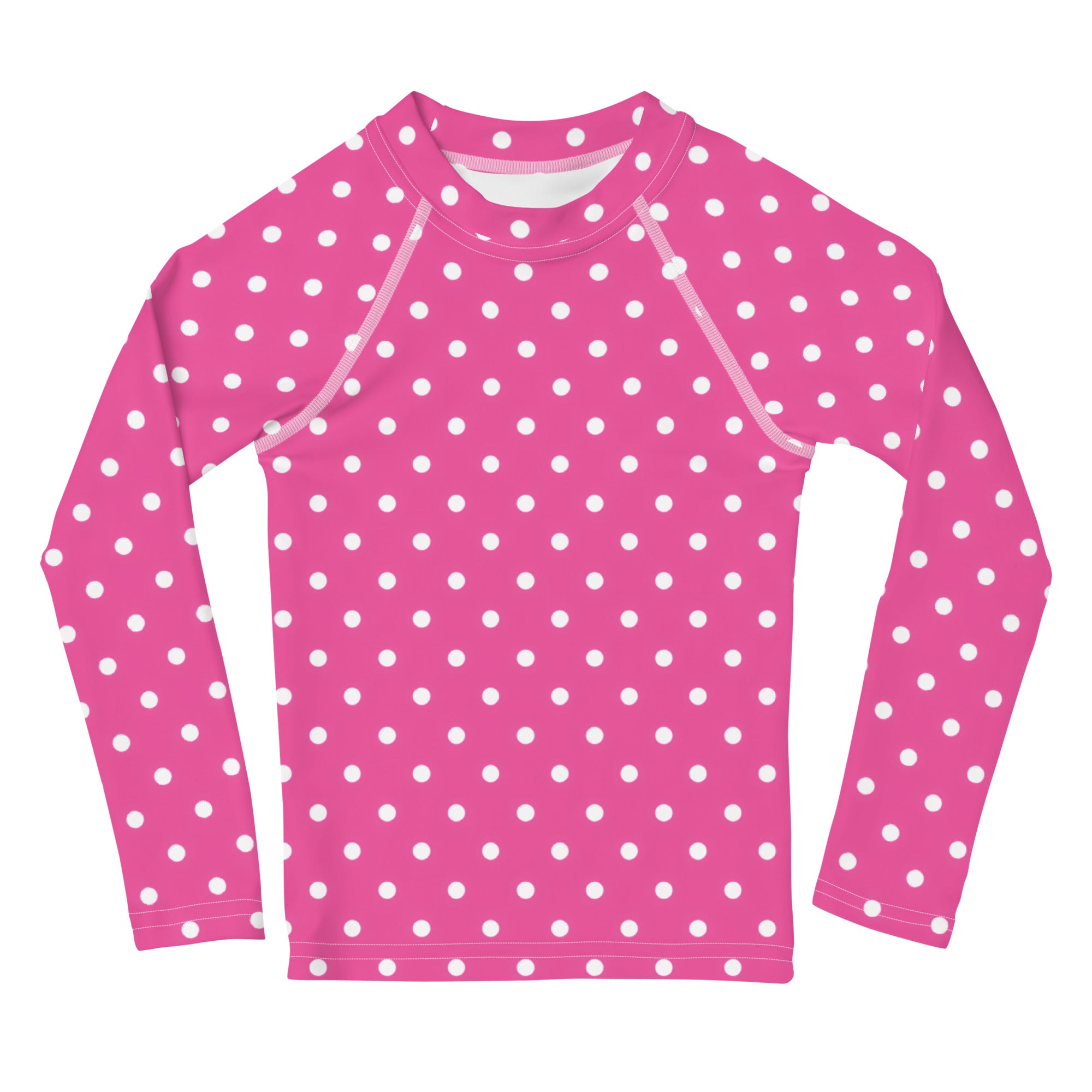 Girls pink long sleeve rash guard swim shirt with white polka dots and upf 50 plus for sun protection