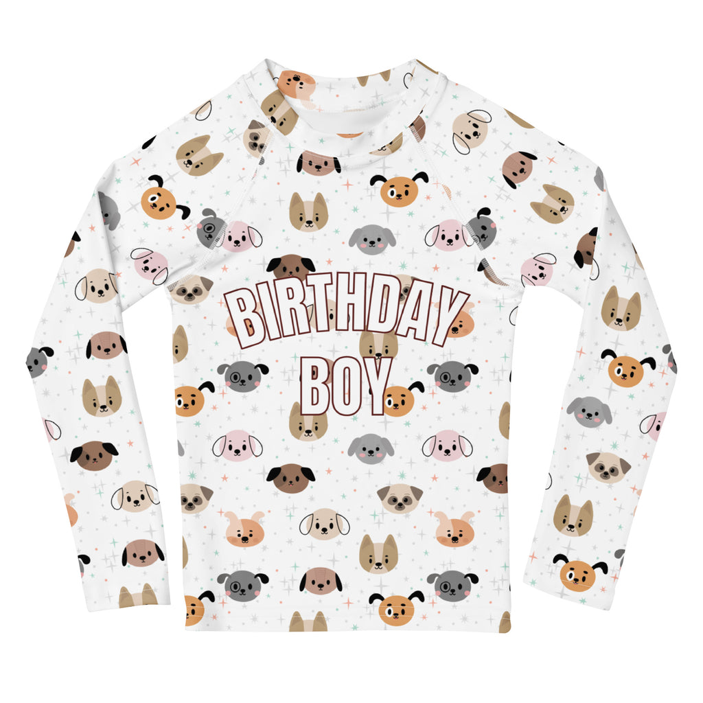 White long sleeve rash guard swim shirt with playful cartoon dogs and birthday boy text featuring UPF 50+ protection