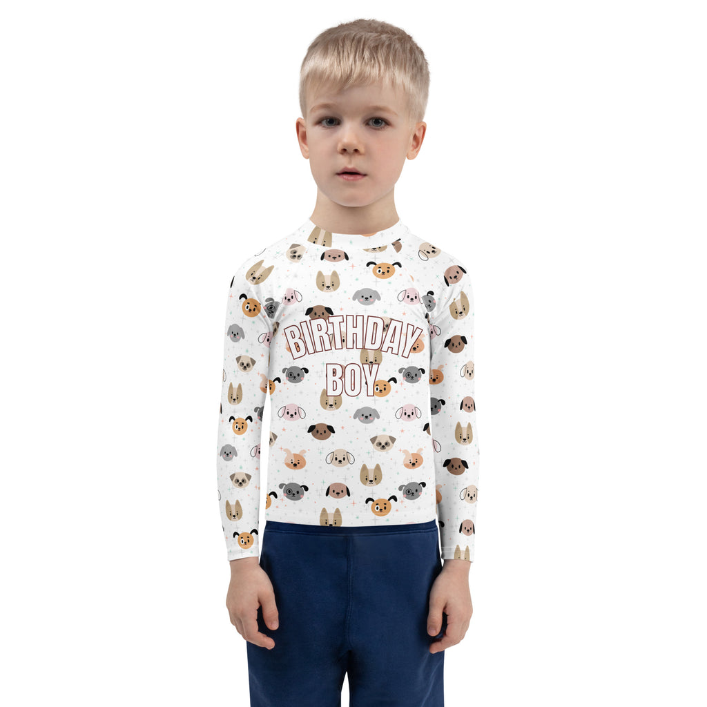 White long-sleeved rash guard swim shirt with colorful cartoon dogs and birthday boy text with upf 50+ protection