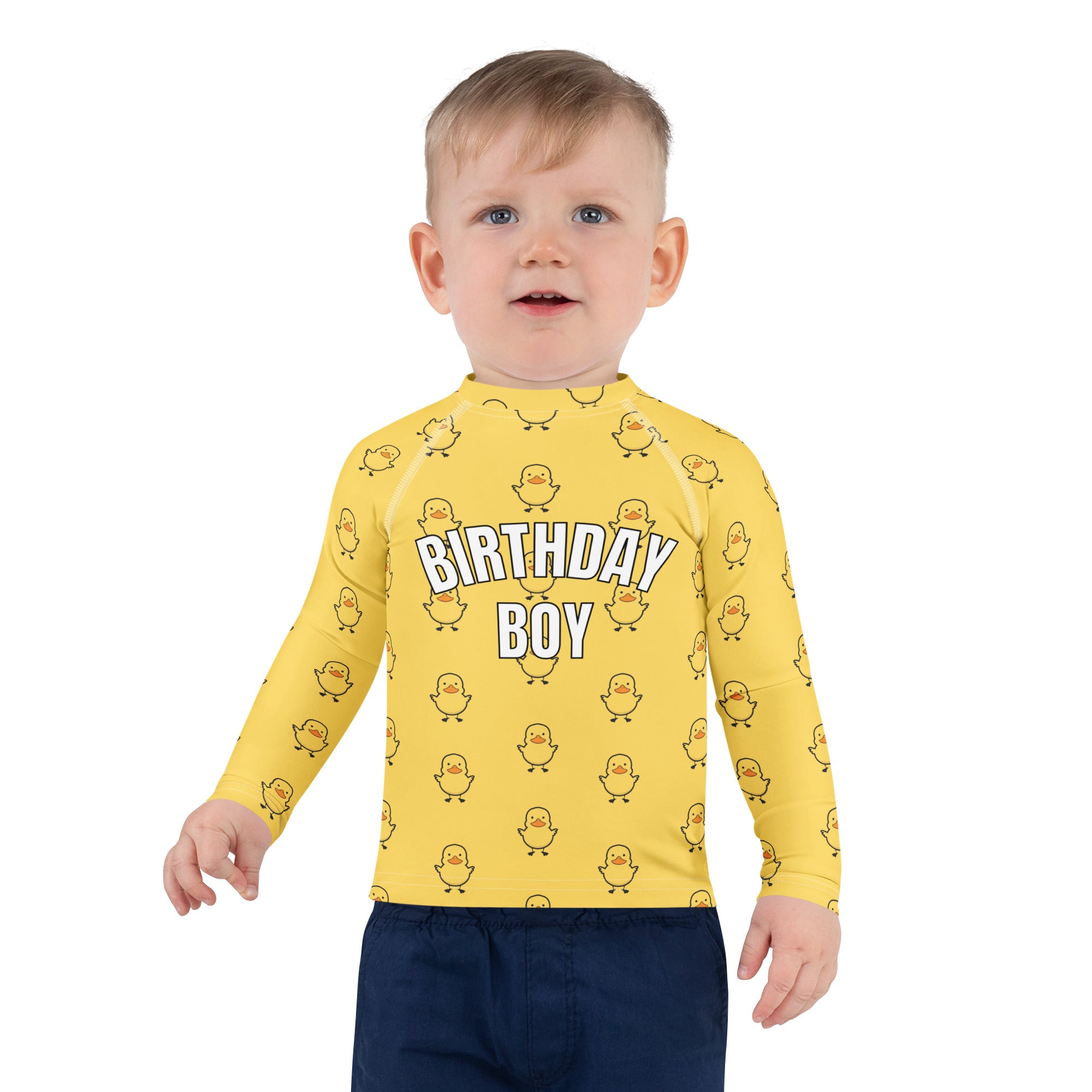 Yellow long sleeve rash guard swim shirt with cartoon ducklings pattern and white birthday boy lettering with upf 50+