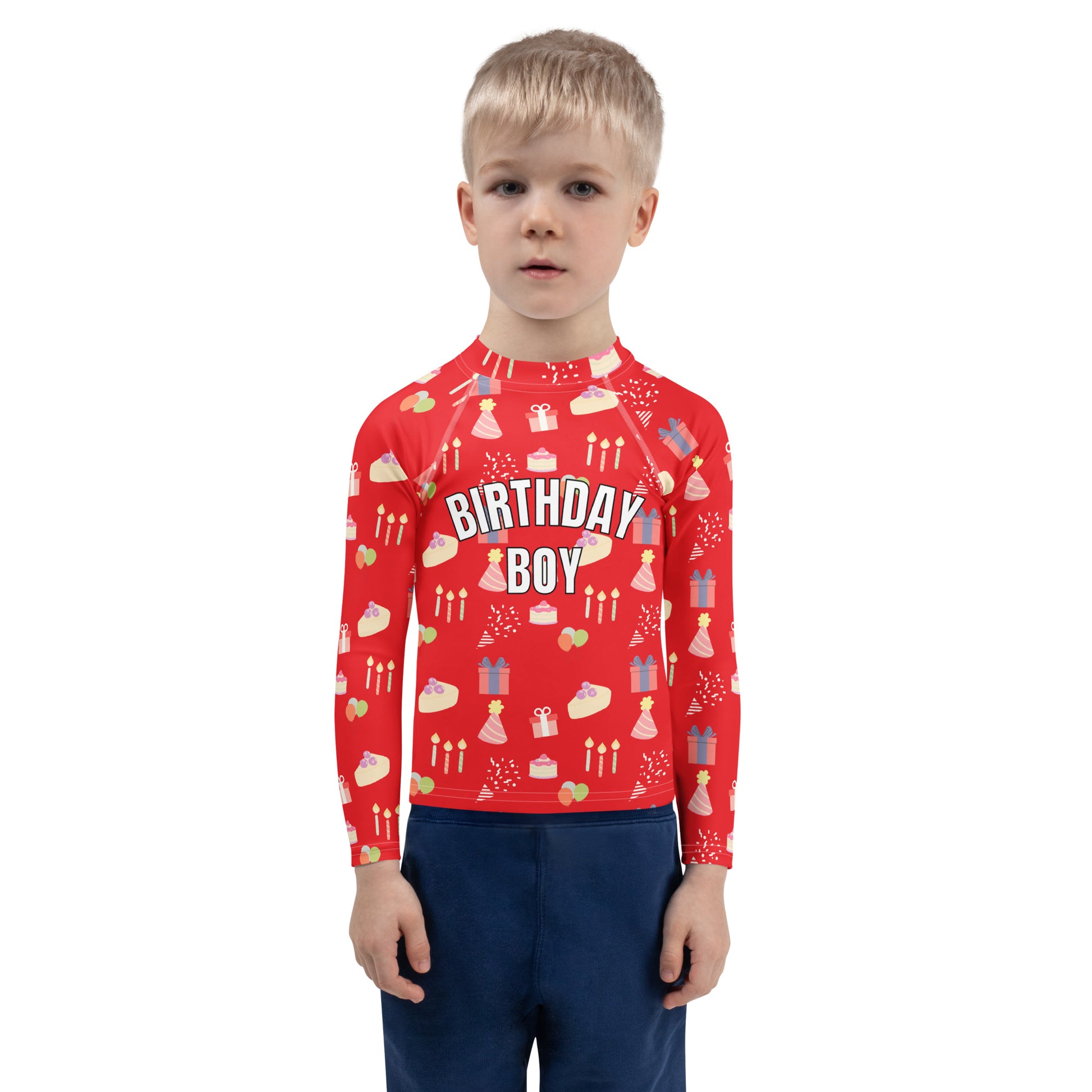 Child wearing a red 'Birthday Boy' themed shirt on a white background