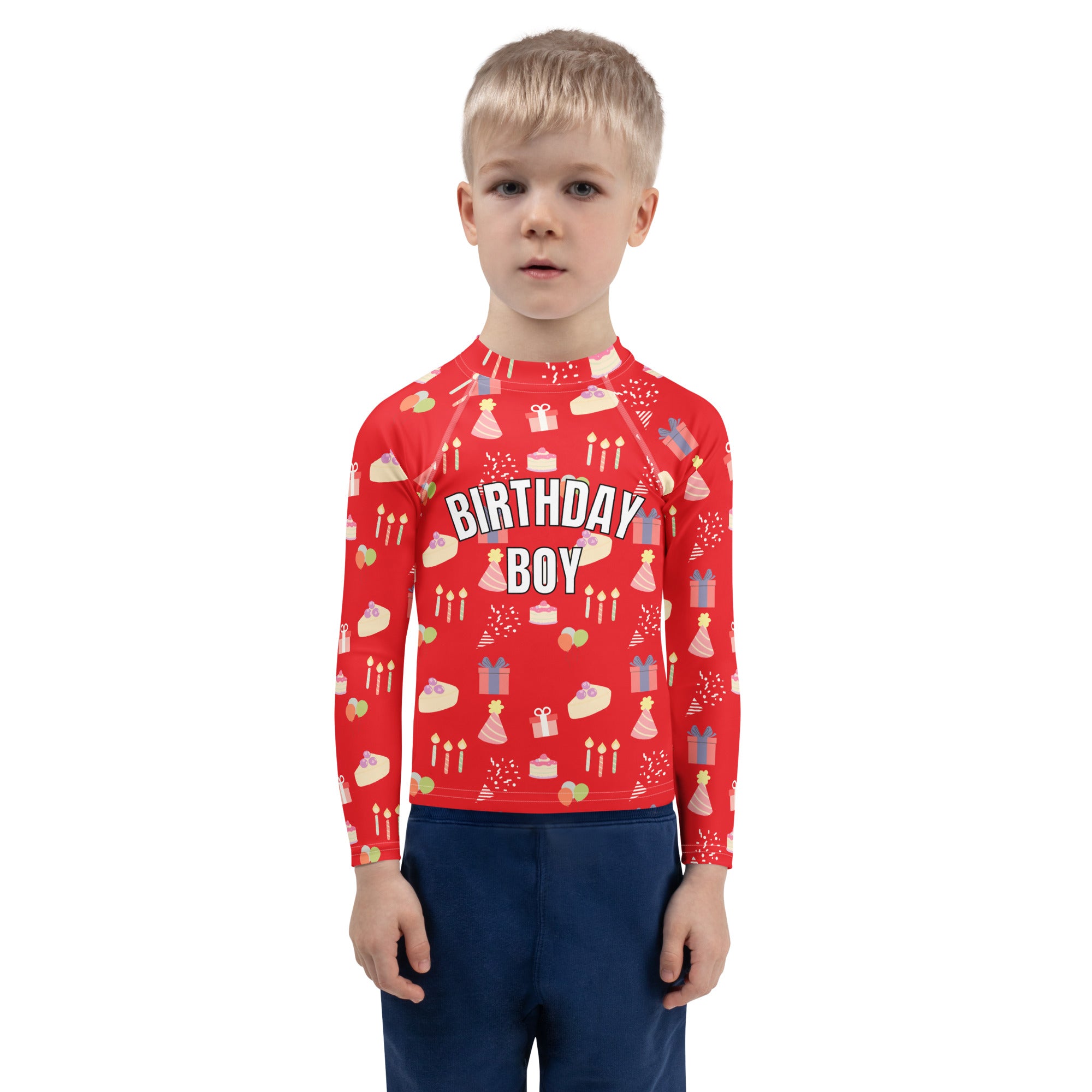 Child wearing a red 'Birthday Boy' themed shirt on a white background
