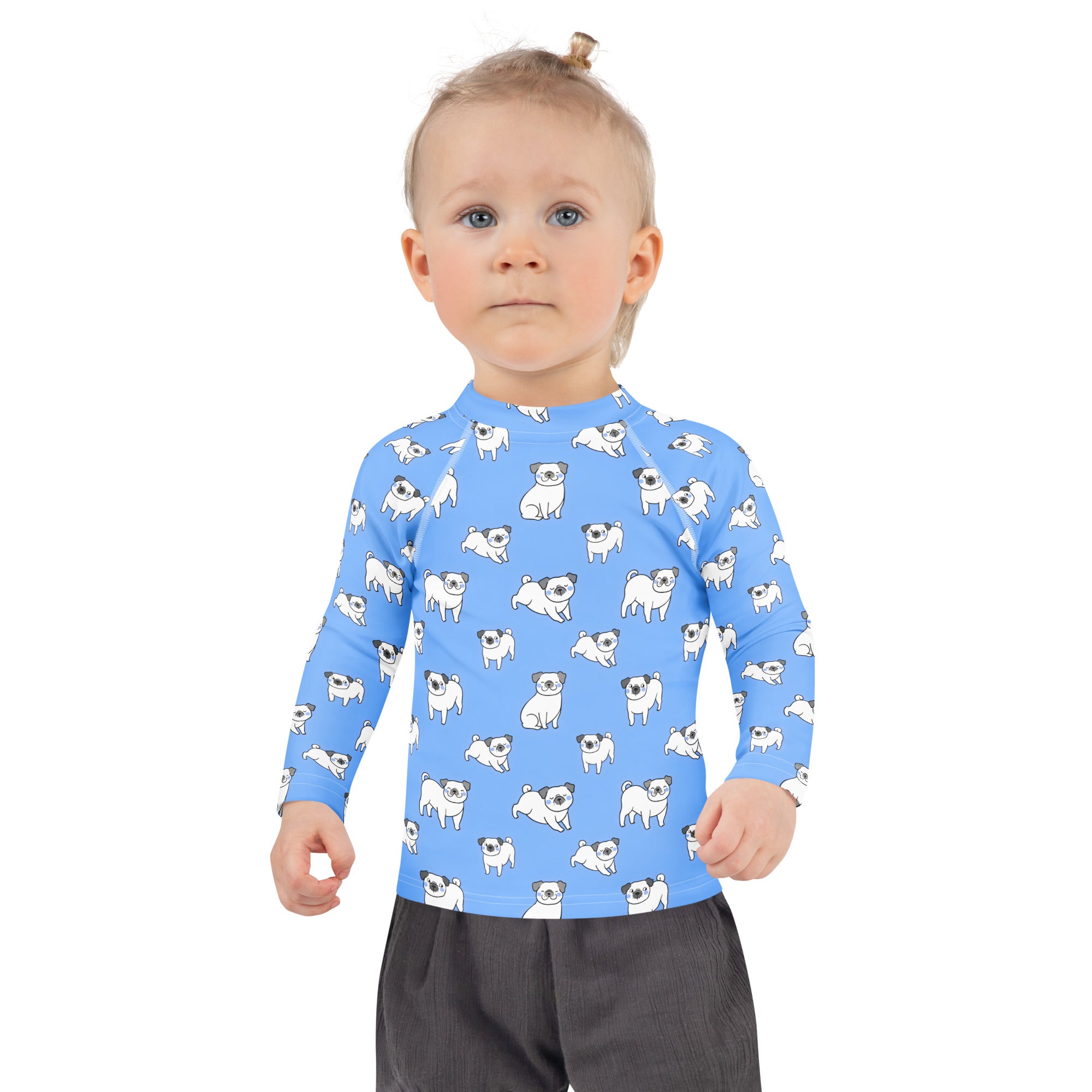 Kids blue long sleeve rash guard swim shirt with UPF 50 plus featuring a playful white pug dog print