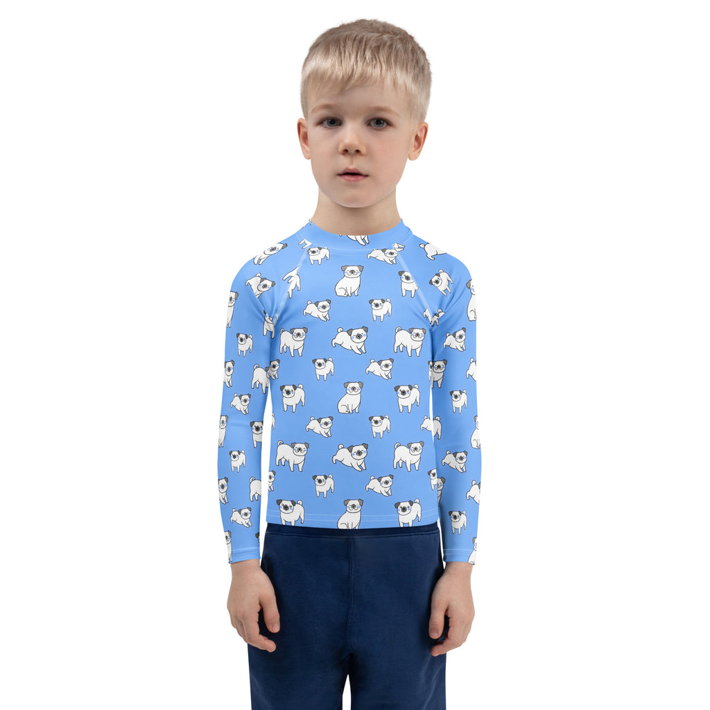 Kids blue pug long sleeve rash guard swim shirt with UPF 50 plus featuring a playful white cartoon pug pattern