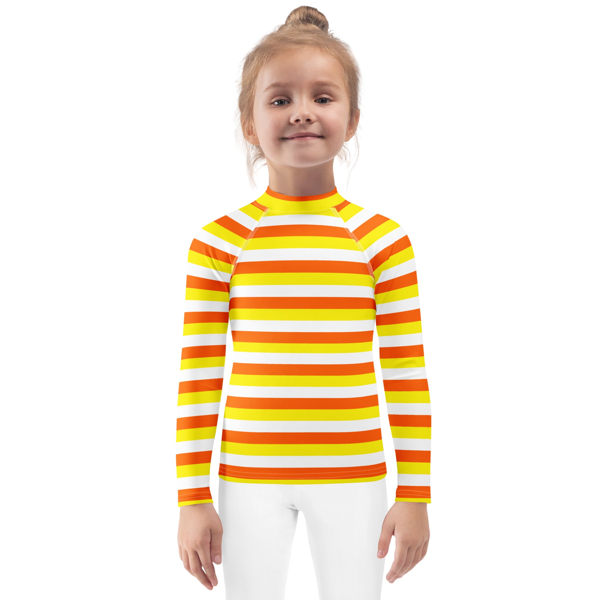 A kids long-sleeved rash guard with bold yellow orange and white candy corn stripes and UPF 50 plus swim shirt