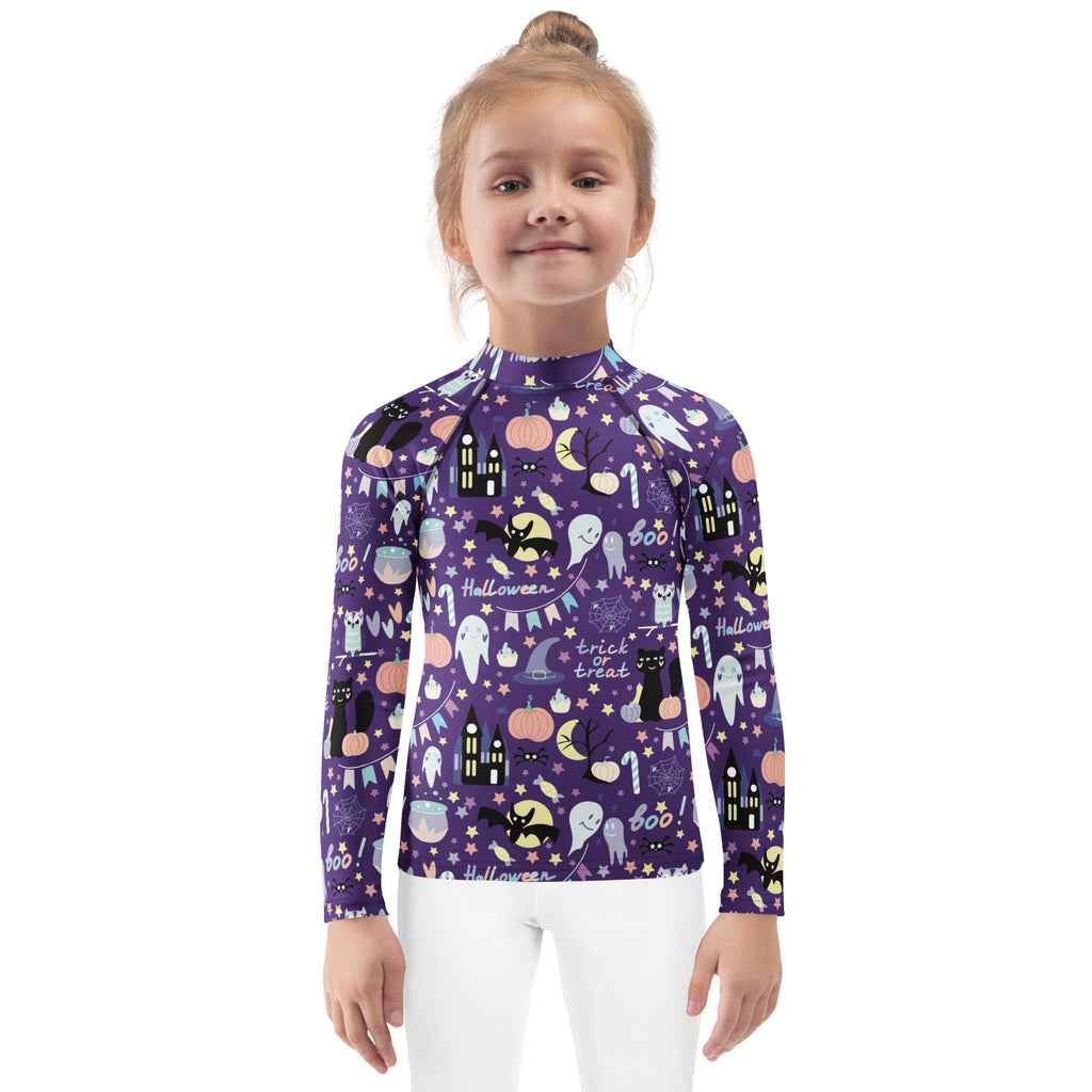Kids spooky halloween purple long sleeve rash guard swim shirt with upf 50 plus featuring ghosts pumpkins bats and castles