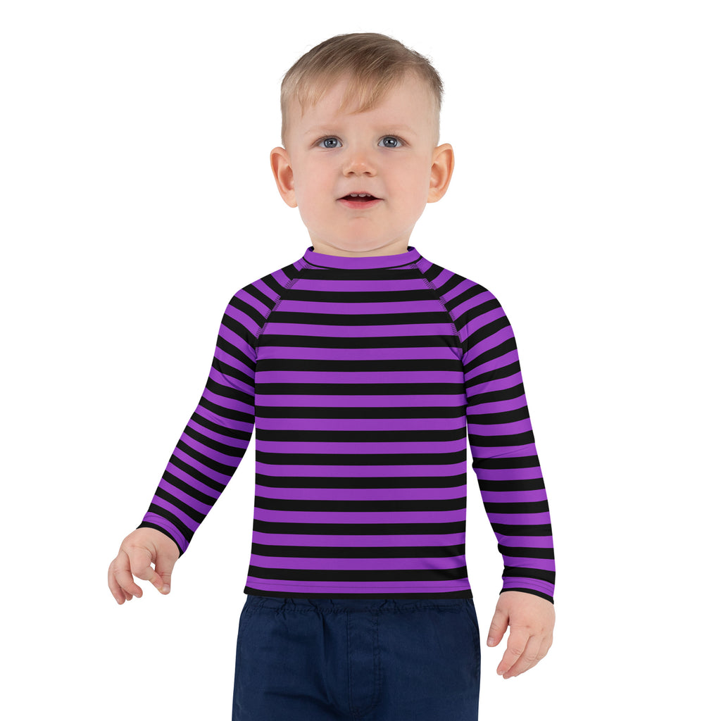 Kids purple and black halloween long sleeve rash guard swim shirt with upf 50 plus in horizontal stripes