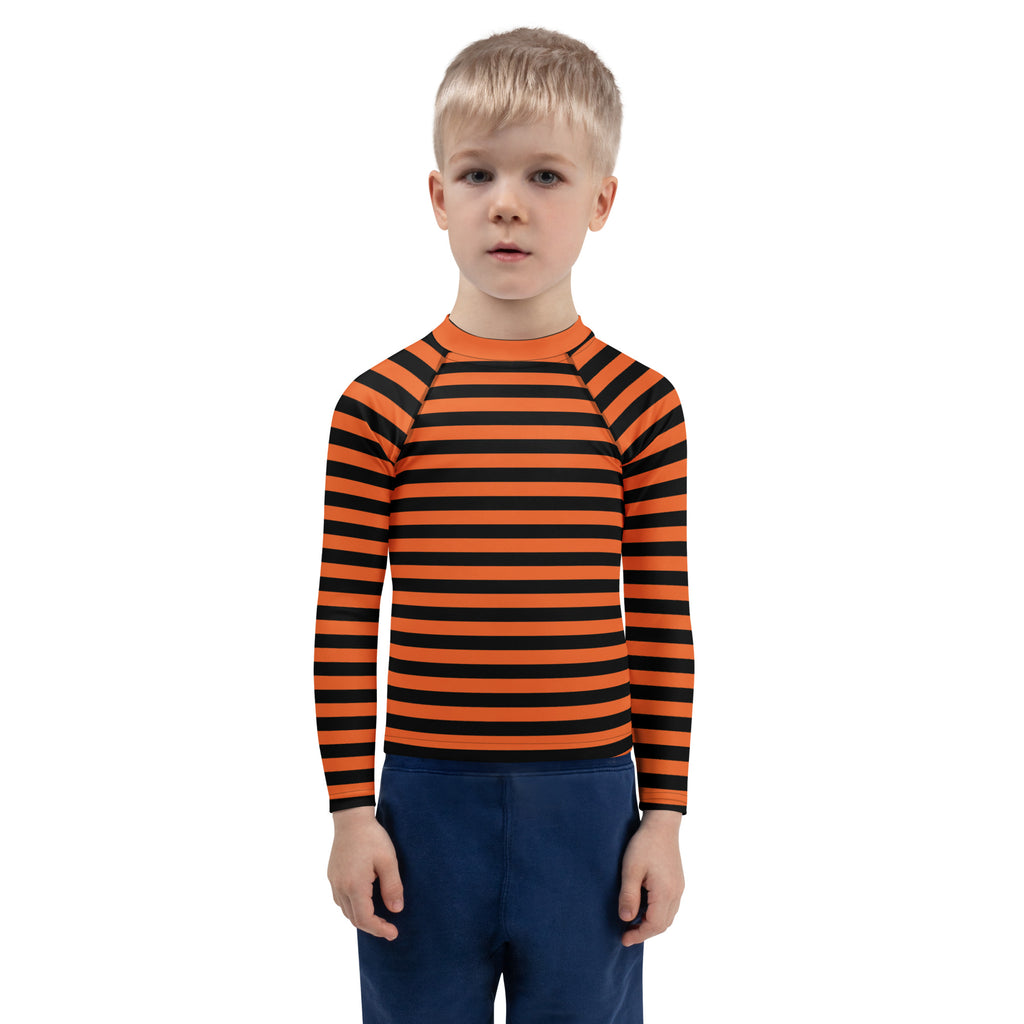 Kids orange and black Halloween long sleeve rash guard swim shirt with UPF 50 plus protection and horizontal stripes