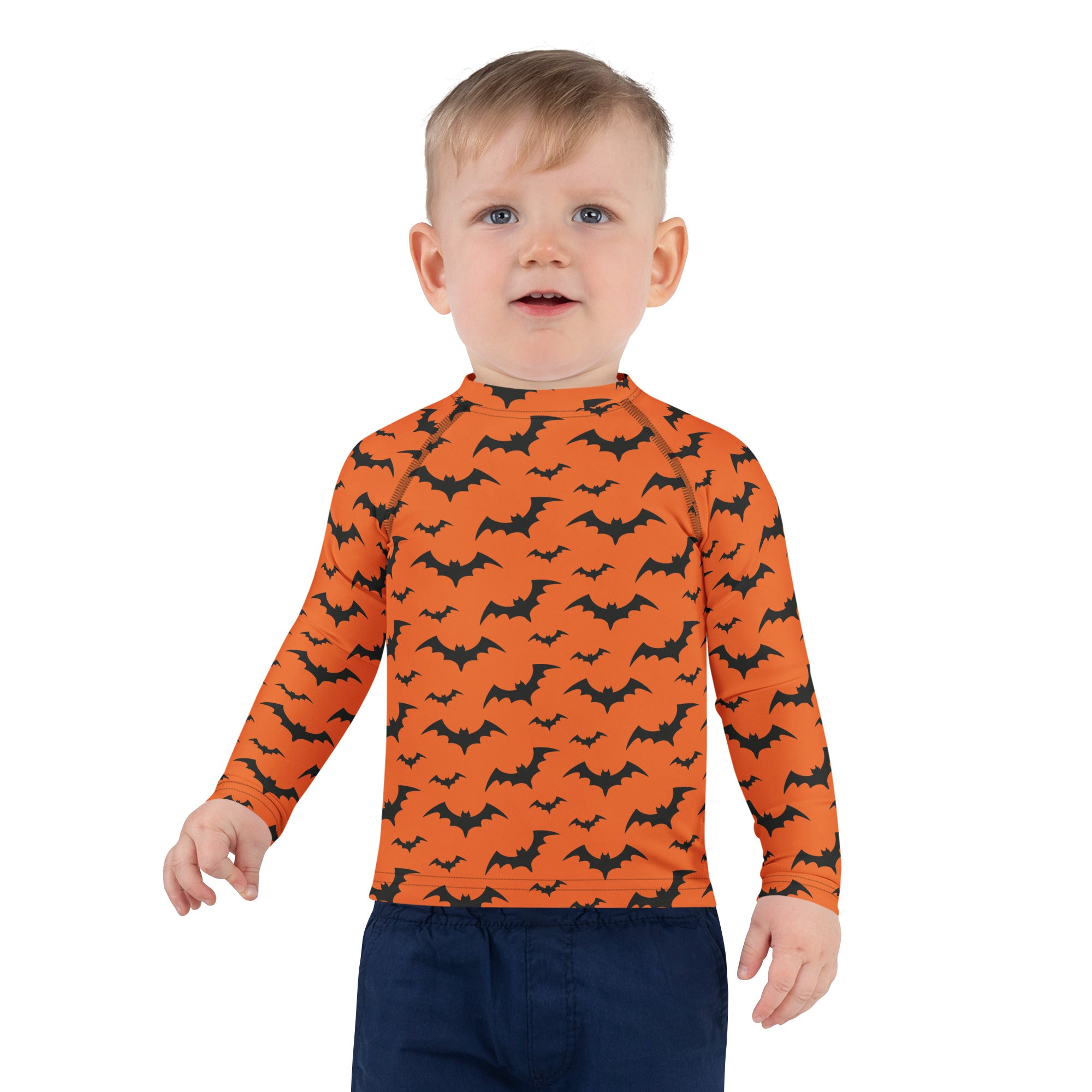 Kids orange long sleeve rash guard swim shirt with black bat pattern and upf 50 plus for halloween