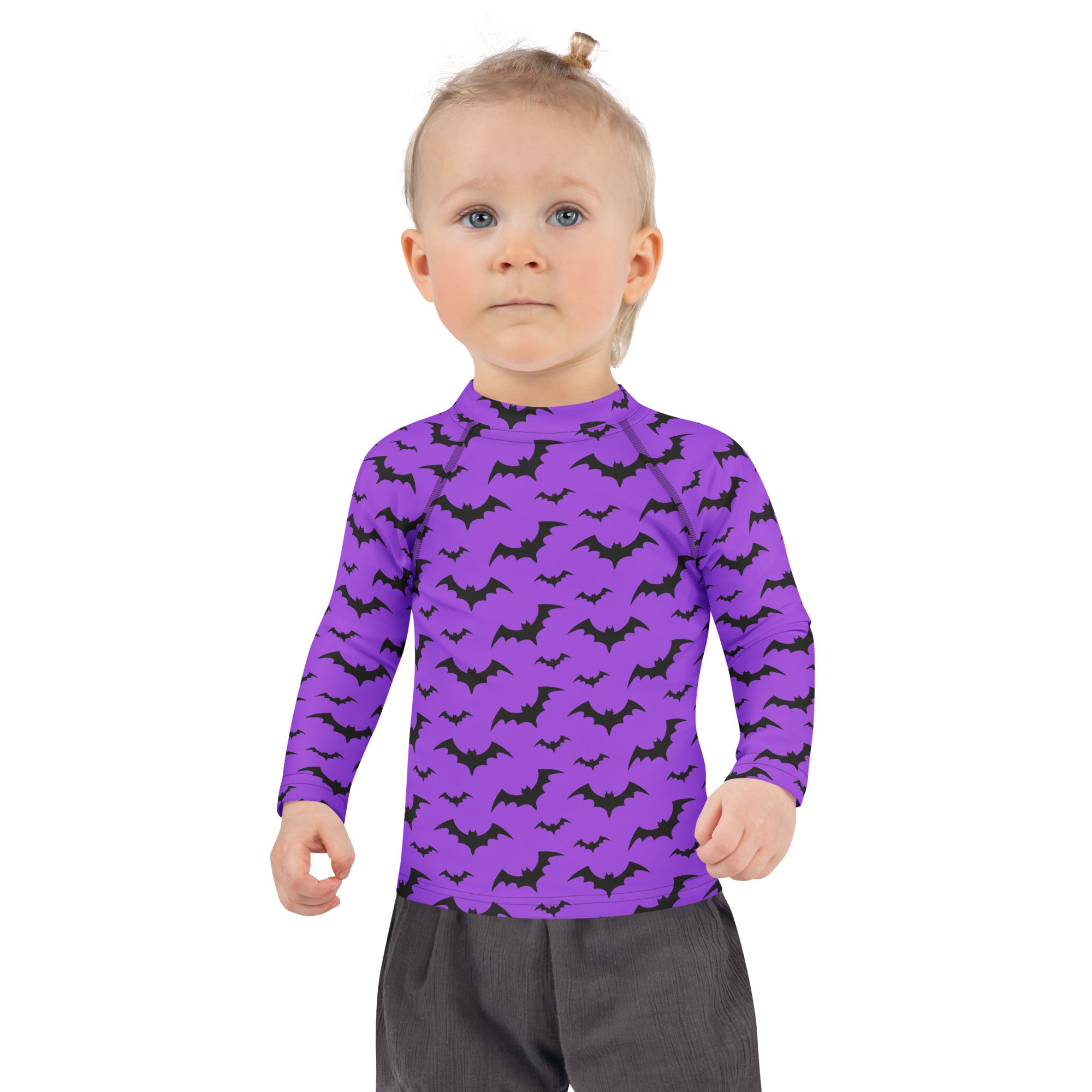 Kids purple long sleeve rash guard swim shirt with black bat patterns and upf 50 plus for halloween protection