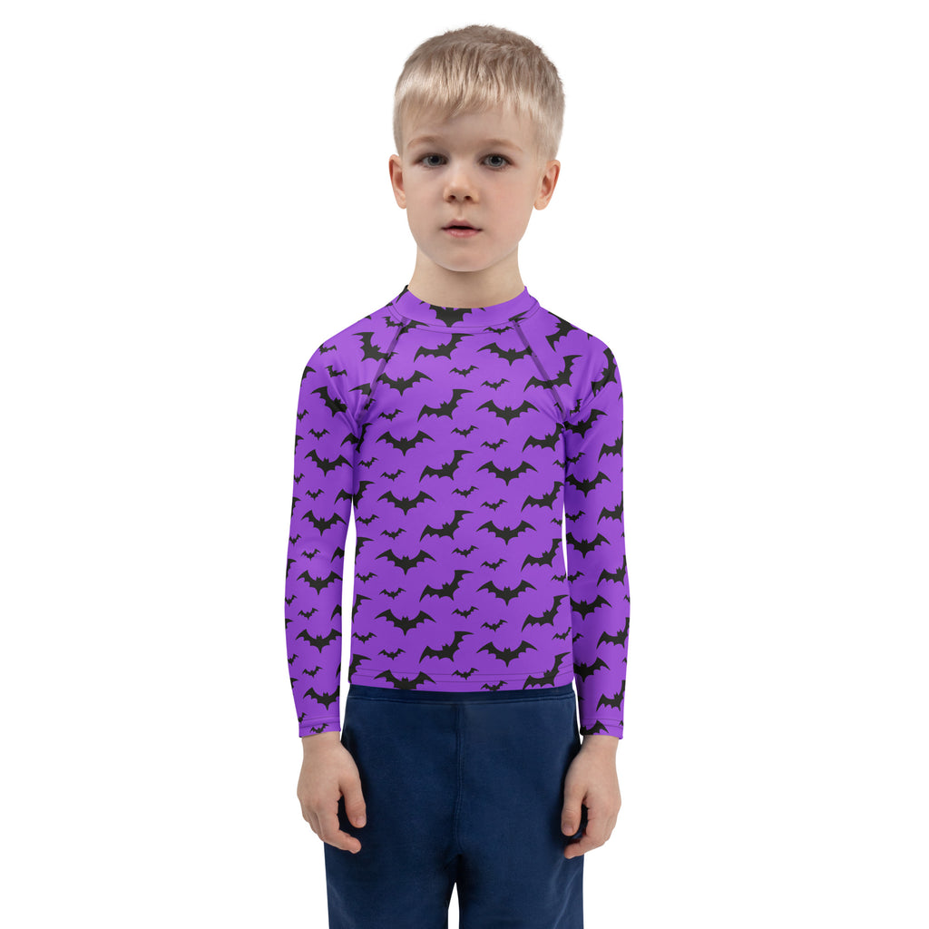 Kids purple long sleeve rash guard swim shirt with black bat patterns and upf 50 plus for halloween