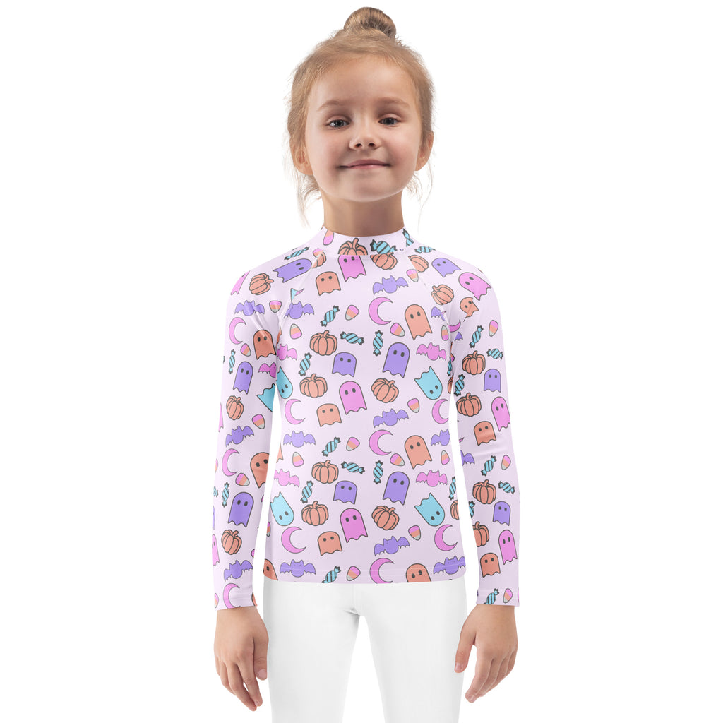 Girls halloween pattern long sleeve rash guard swim shirt in light lavender with pastel ghost pumpkin bat and moon print