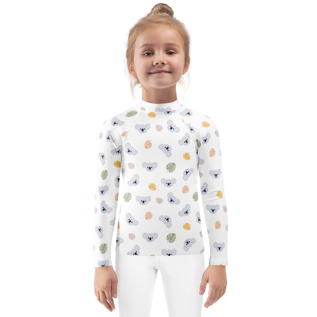 White long-sleeved rash guard with gray koala pattern and colorful tropical leaves, kids UPF 50+ swim shirt