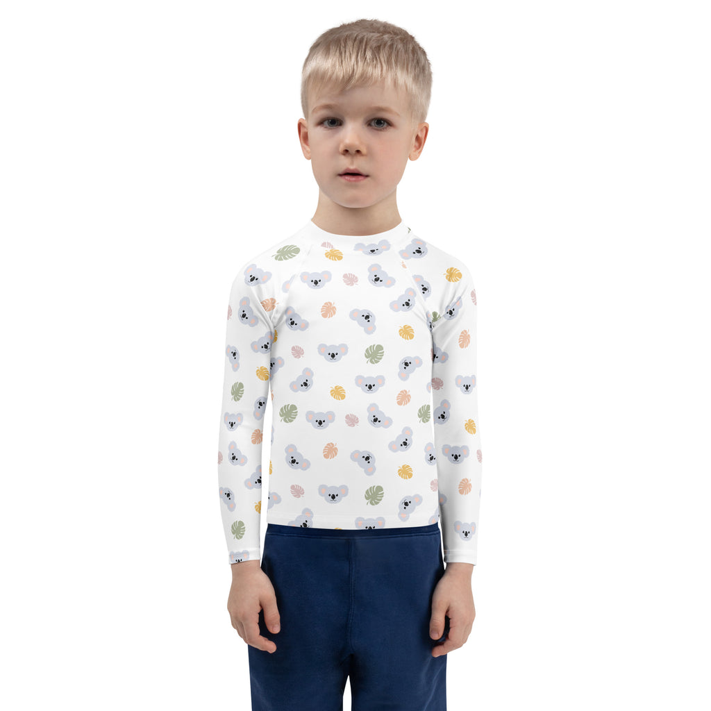 White kids long sleeve rash guard swim shirt with gray koalas colorful tropical leaves and upf 50 plus protection