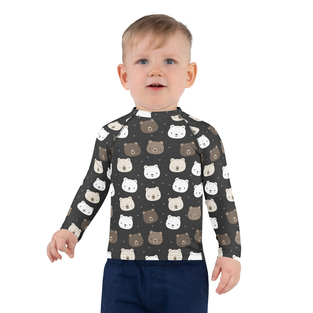 A child wearing a dark gray kids bear faces long sleeve rash guard swim shirt with UPF 50 plus protection