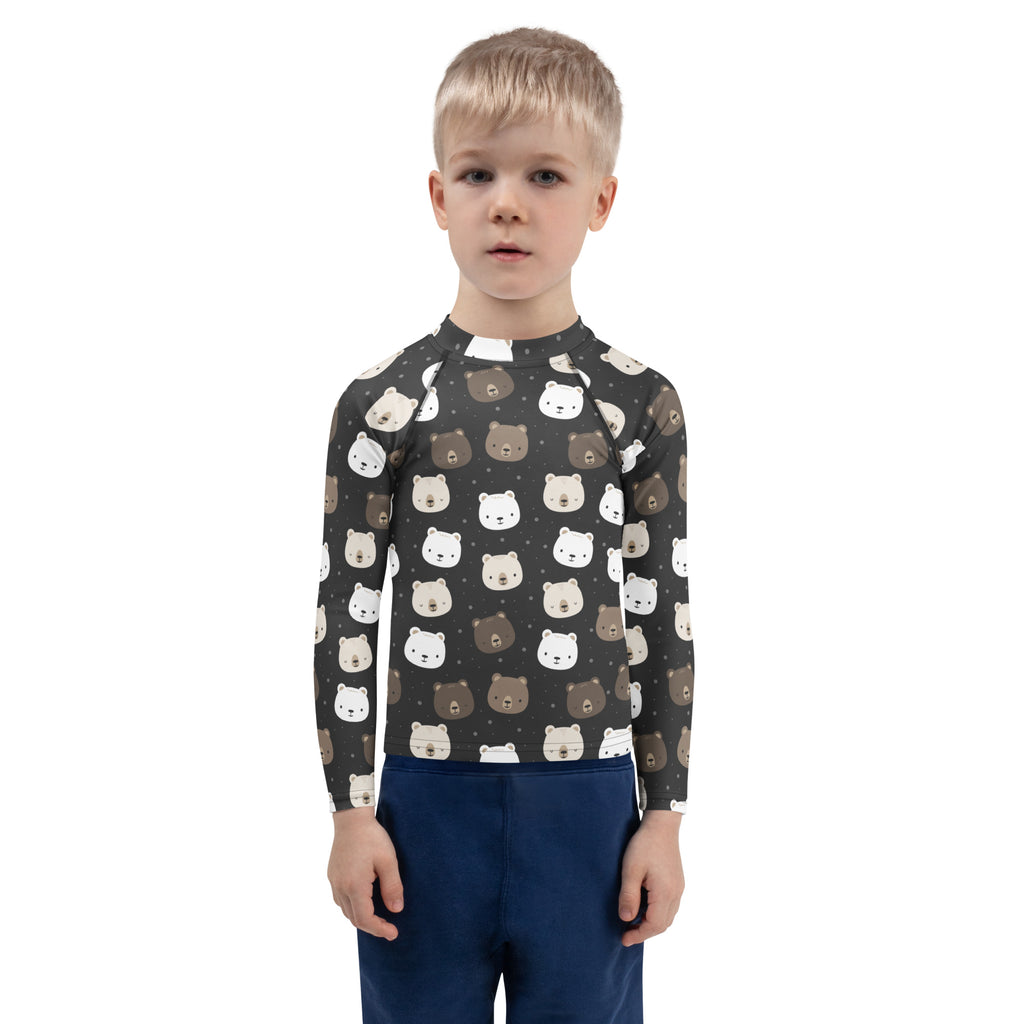 A child wearing a dark gray kids bear faces long sleeve rash guard swim shirt with UPF 50 plus protection