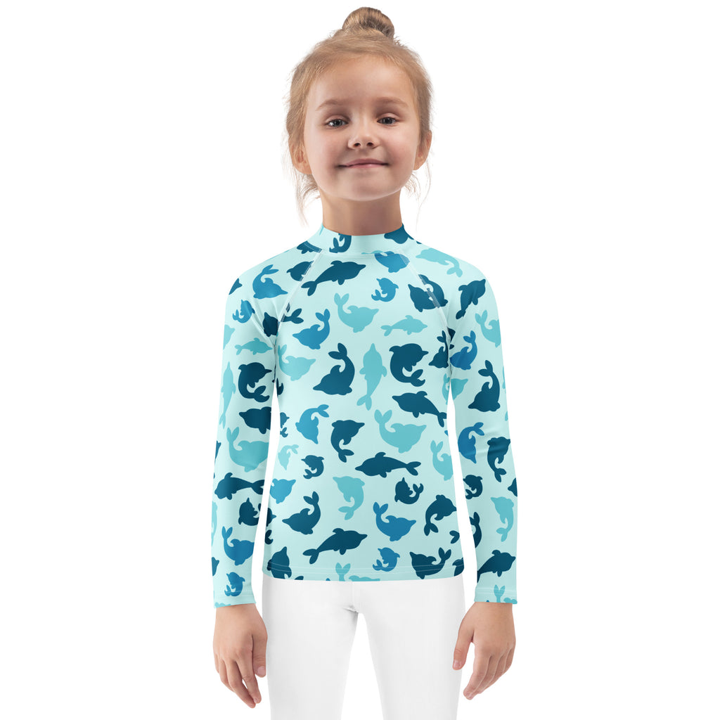 Kids blue dolphin long sleeve rash guard swim shirt with UPF 50 plus featuring playful dolphin silhouettes pattern