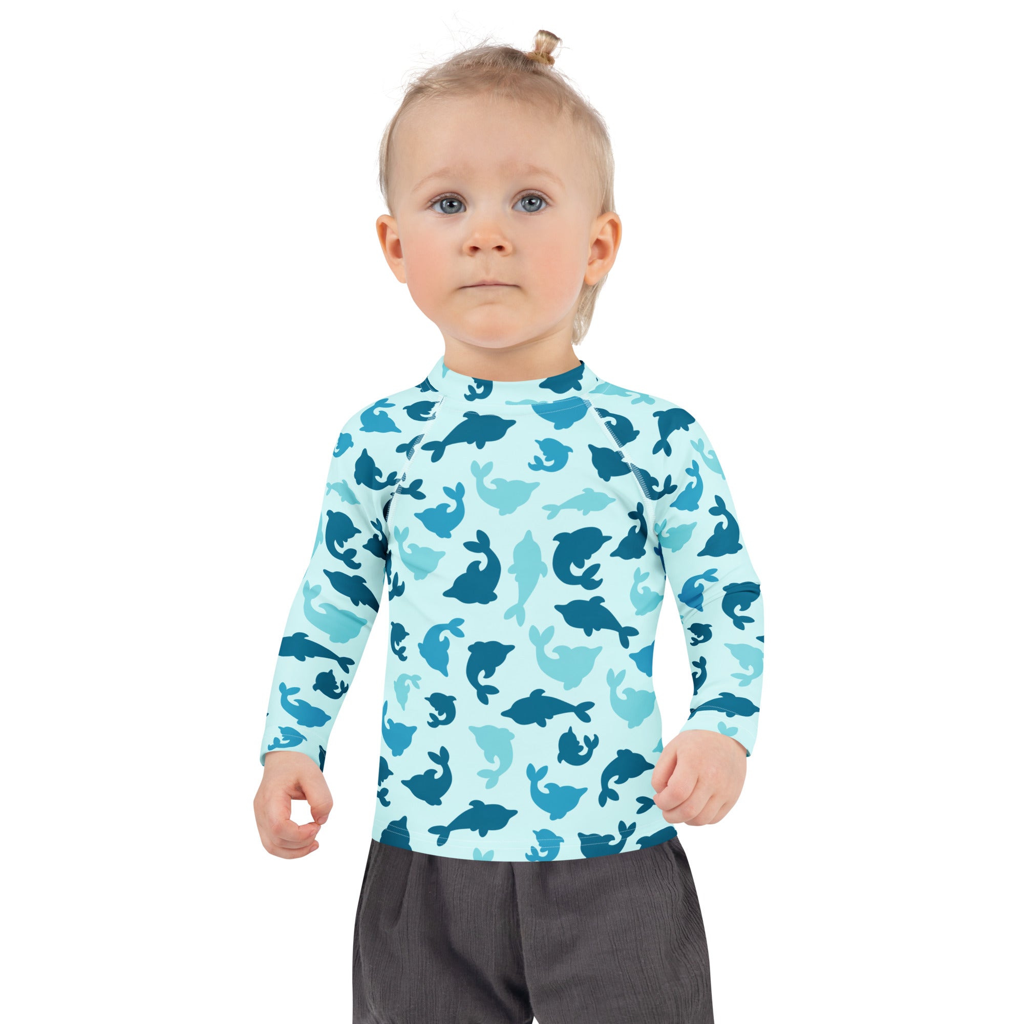 Kids blue dolphin long sleeve rash guard swim shirt with upf 50 plus featuring a playful pattern of blue whales