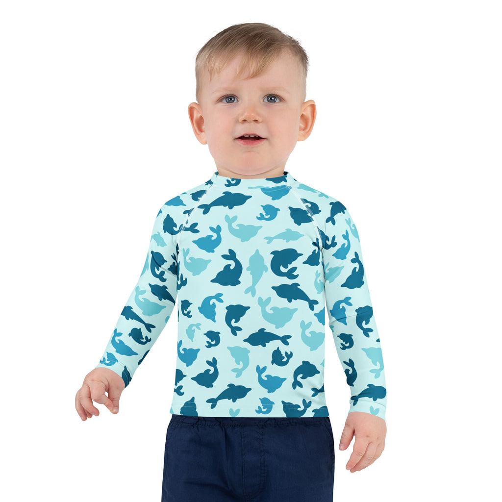 Kids blue dolphin long sleeve rash guard swim shirt with upf 50 plus featuring a playful blue dolphin pattern