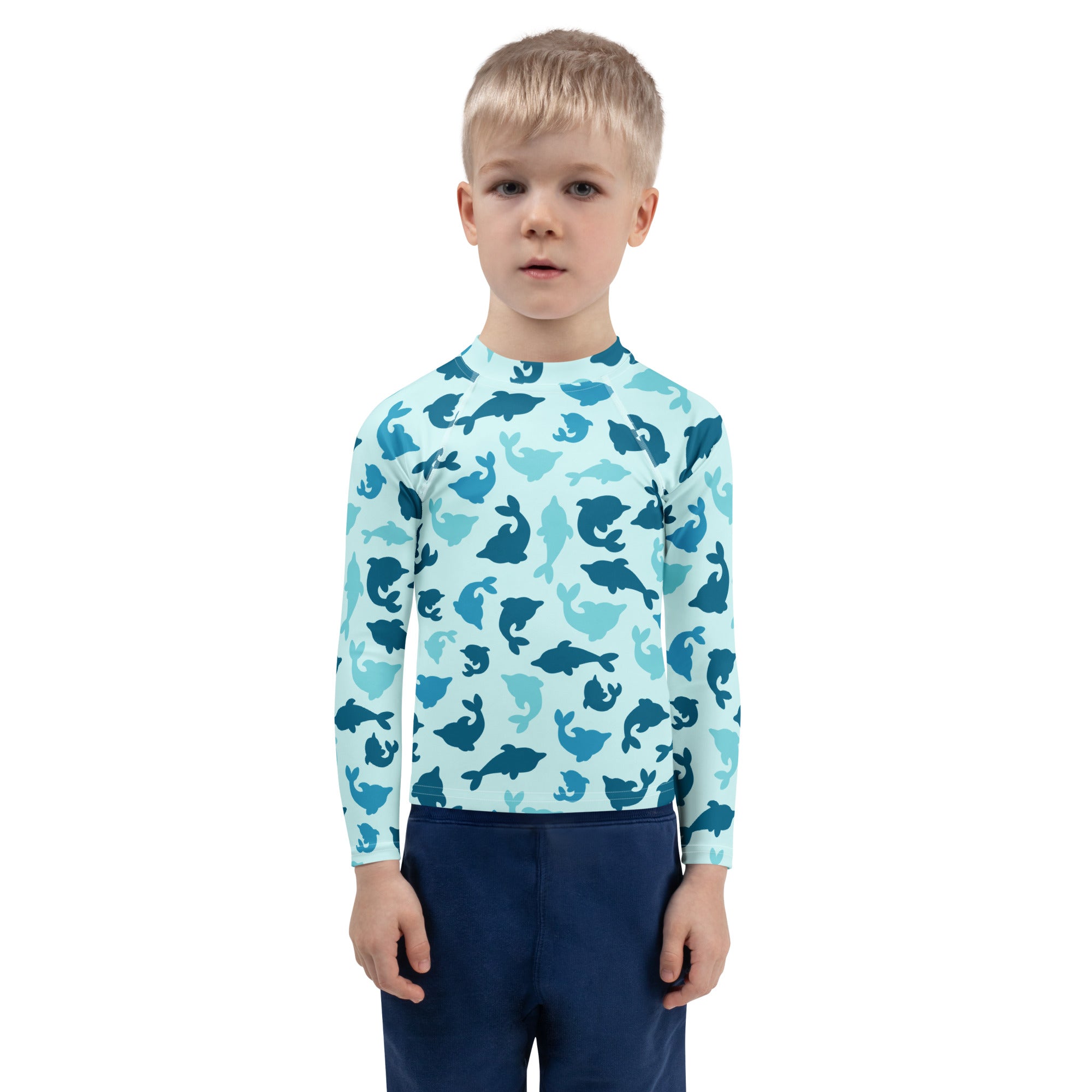 Light blue kids long sleeve rash guard with playful blue dolphin pattern and UPF 50 plus sun protection for swimming