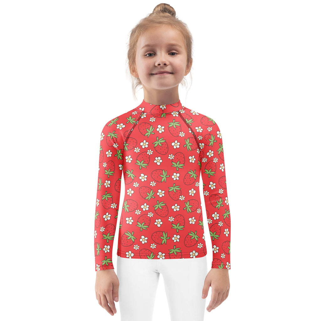 Kids red long sleeve rash guard swim shirt with playful strawberry white flower pattern and upf 50 plus protection
