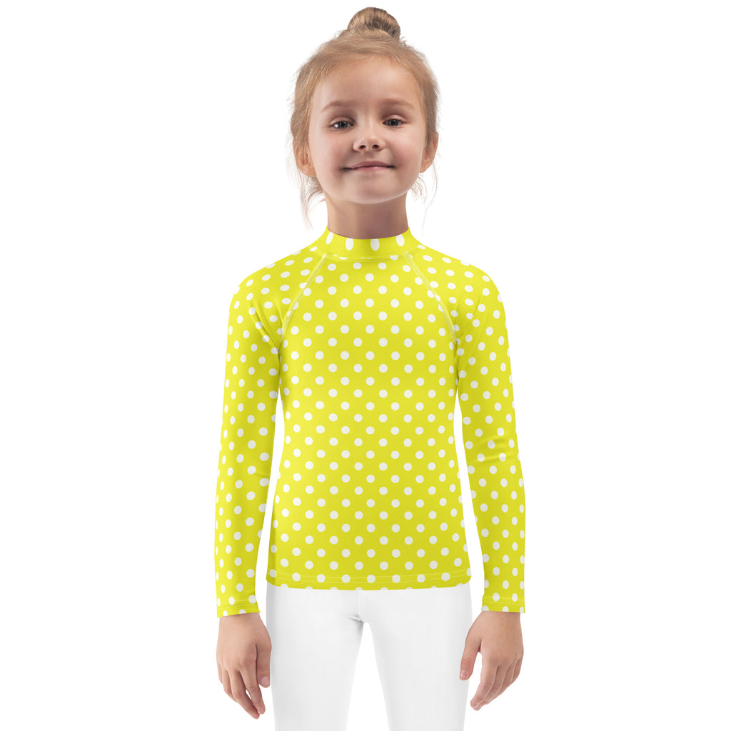 Kids yellow long sleeve rash guard swim shirt with white polka dots and UPF 50 plus sun protection