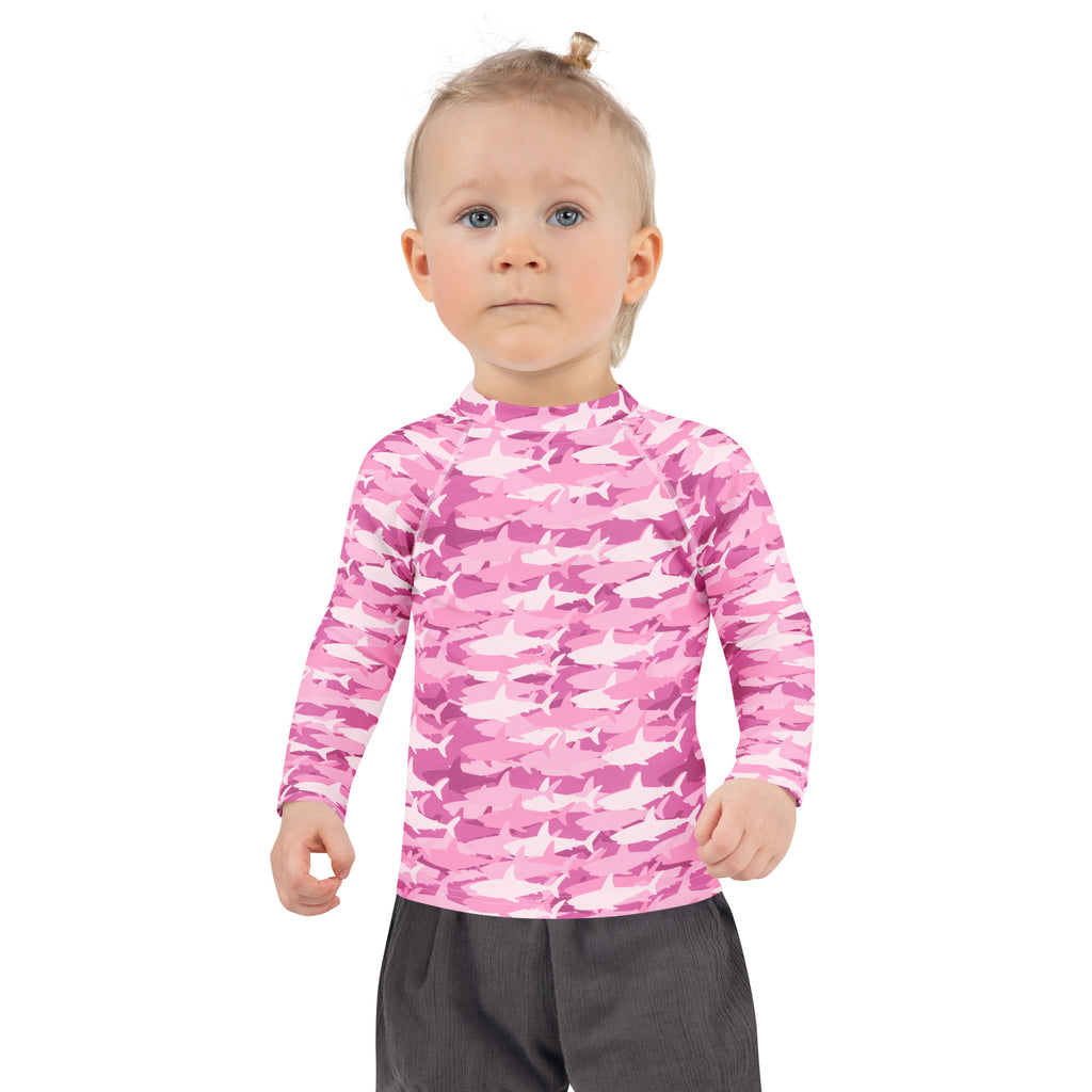 Girls pink shark long sleeve rash guard swim shirt with upf 50 plus made of lightweight stretch fabric for sun protection